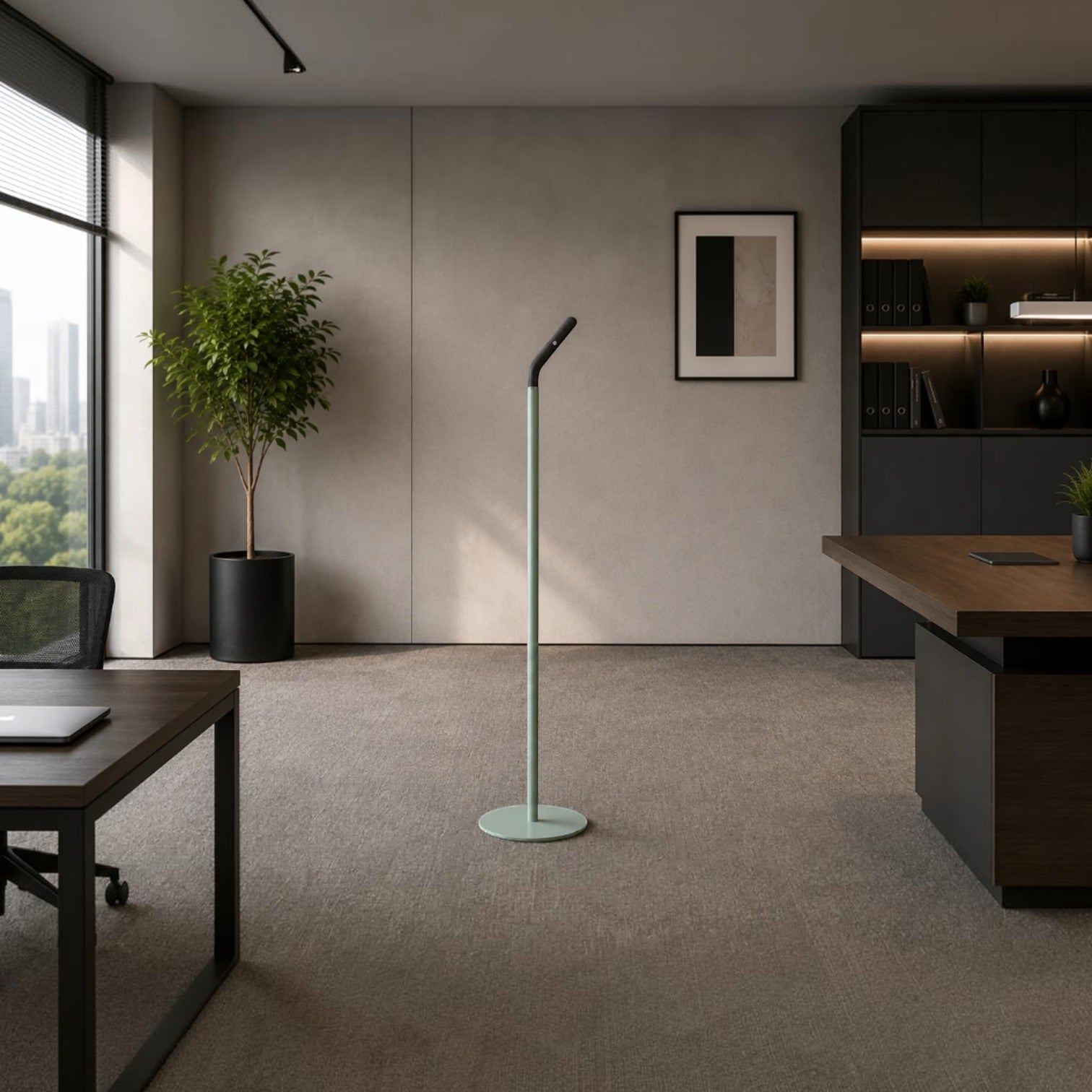 Addo Shop Alfred coat stand with a single hook, featuring a mint green pole and a black angled top in a modern office.