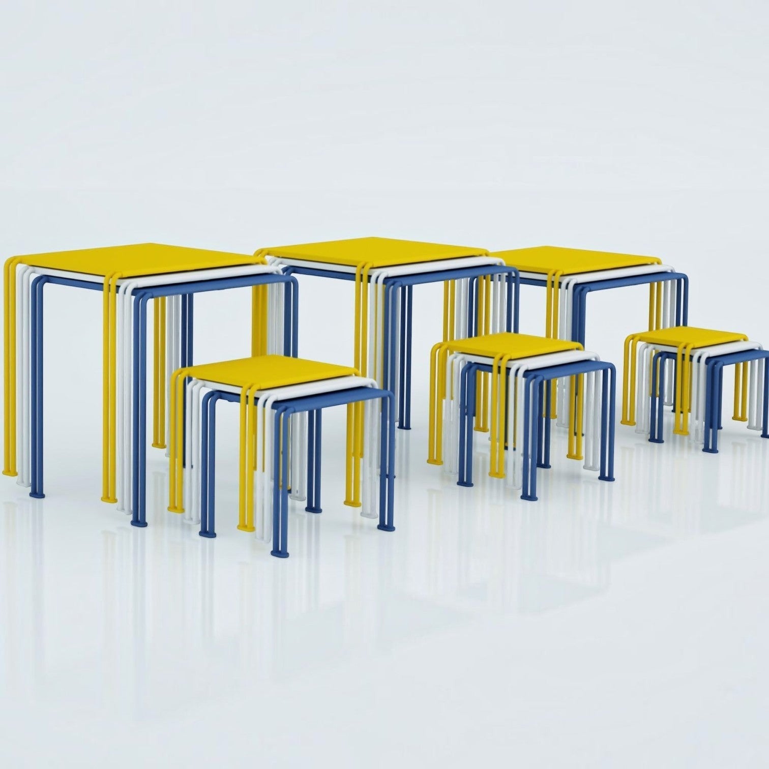 Addo Shop Zeroquindici .015 School nesting tables in yellow, white, and blue metal with a minimalist modern design.