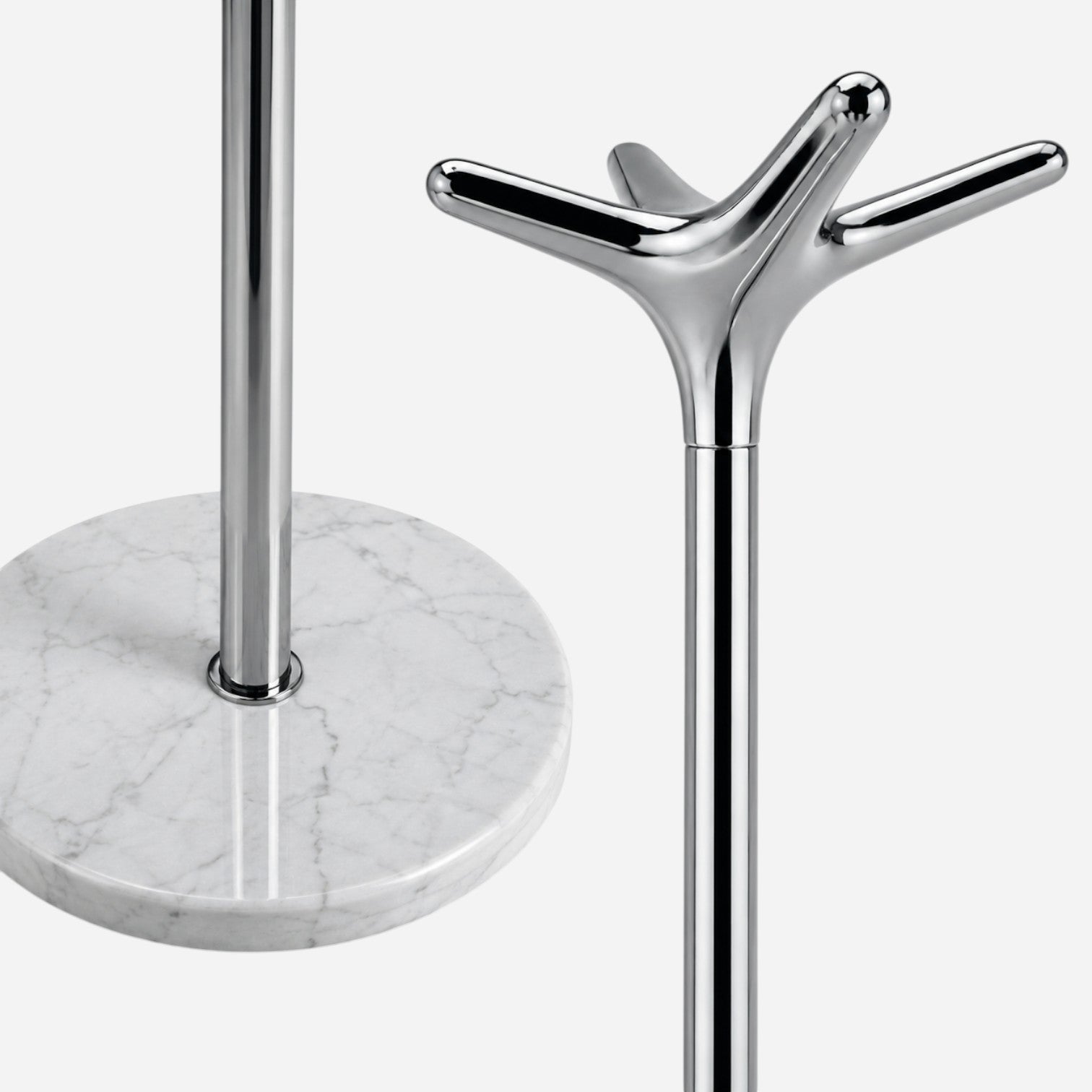 Addo Shop Leda Coat Stand with chrome finish and white marble base. Modern sculptural design.