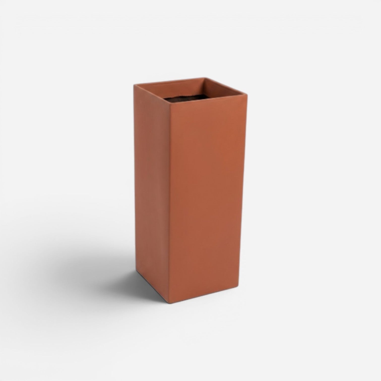 Addo Shop Design Collection 20L terracotta waste bin with a square opening and clean lines.