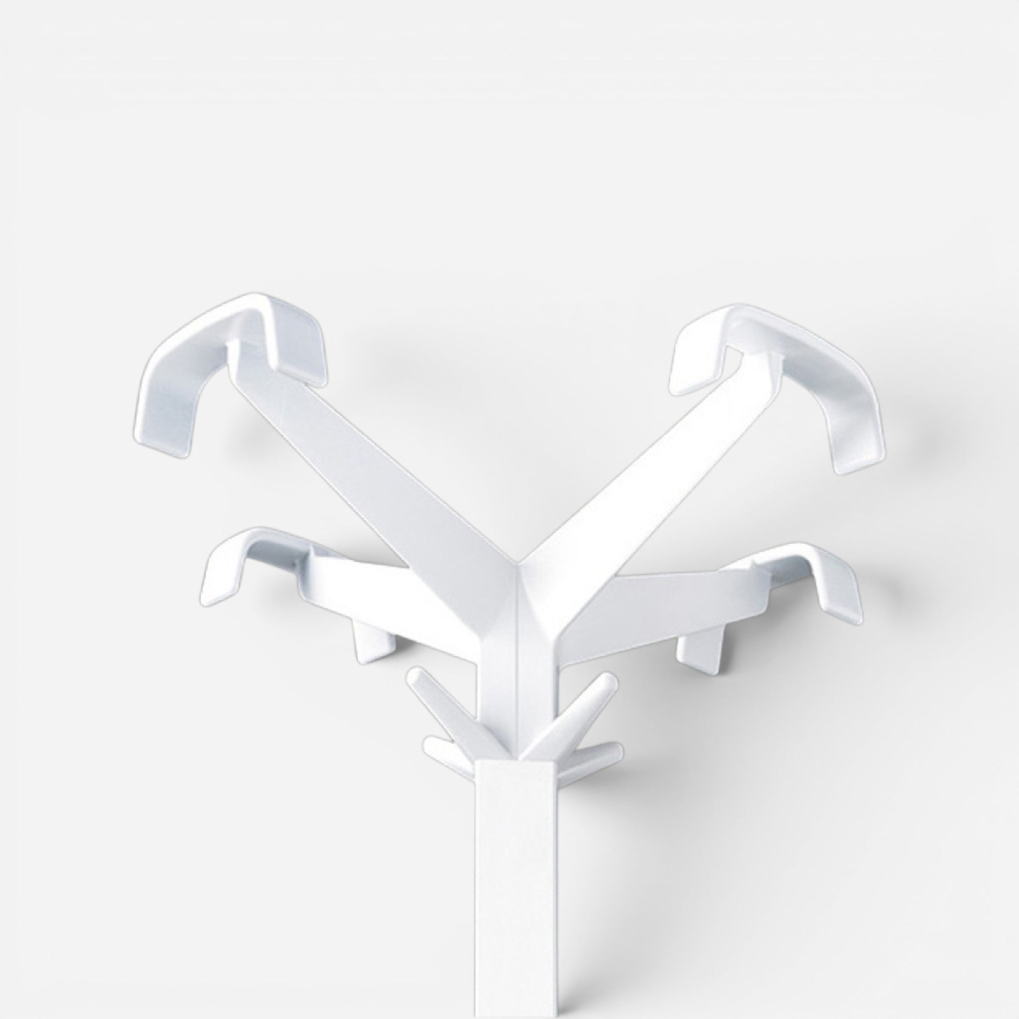 Addo Shop Quadrangolo white metal coat rack with geometric arms for office or waiting areas.