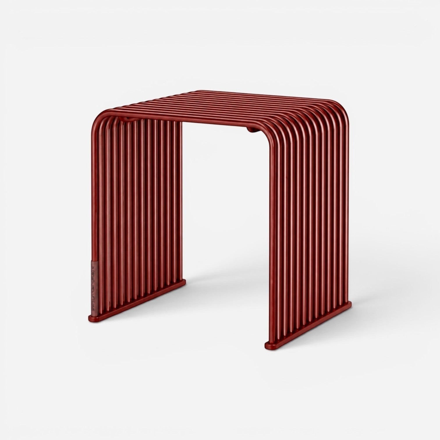 Addo Shop .015 Cube side table in deep red, featuring a modern minimalist design with parallel tubular metal rods.
