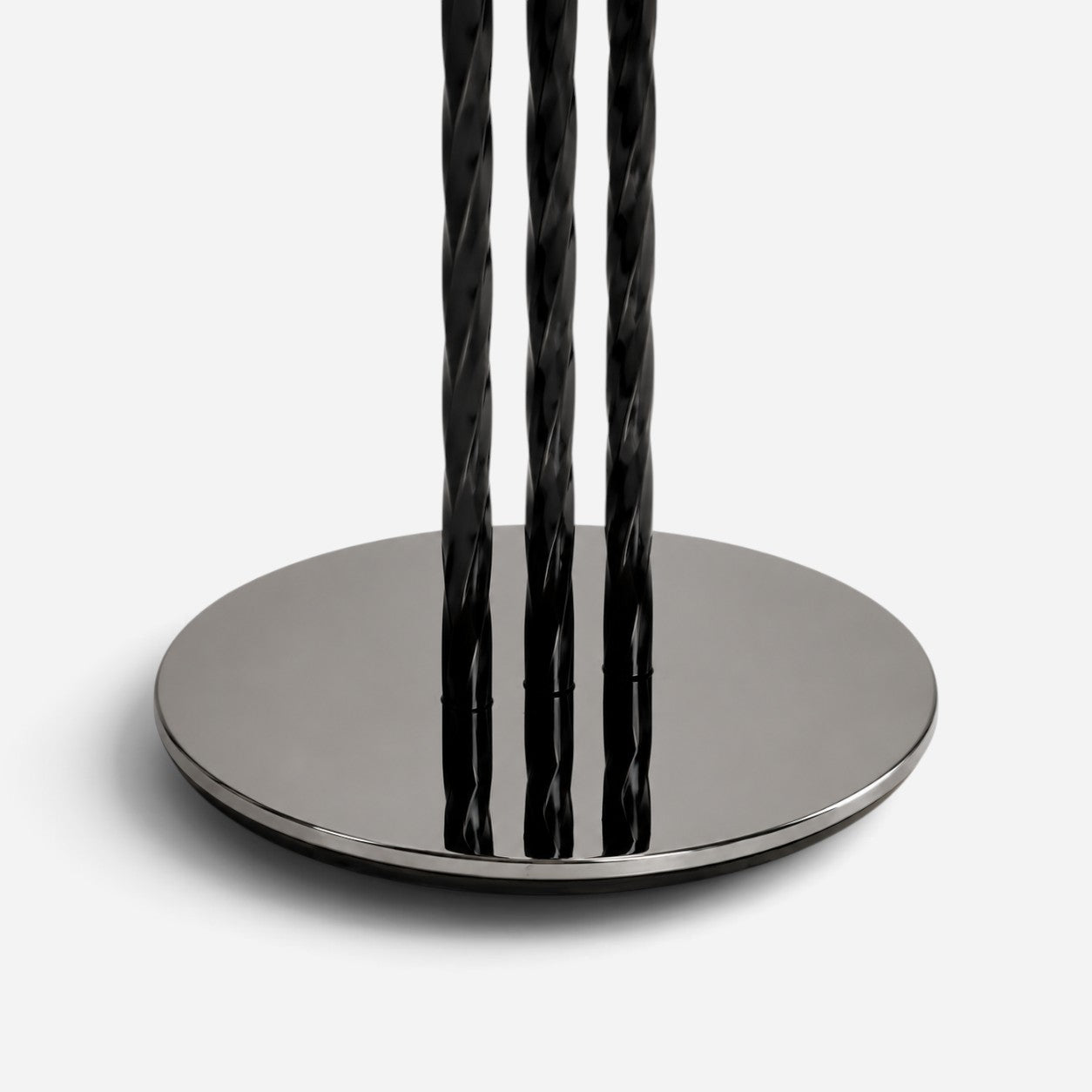 Addo Shop black twisted metal table base with a polished chrome circular stand