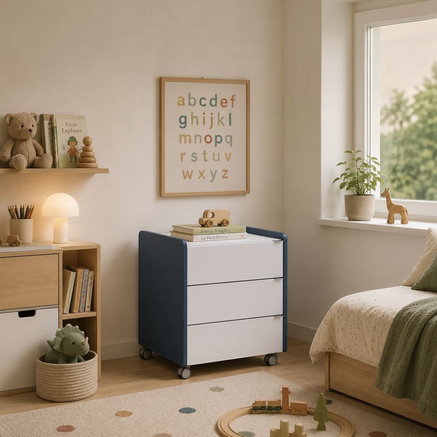 Addo Shop Bridge 3-drawer mobile pedestal in blue and white melamine, featuring smooth castors in a modern nursery.
