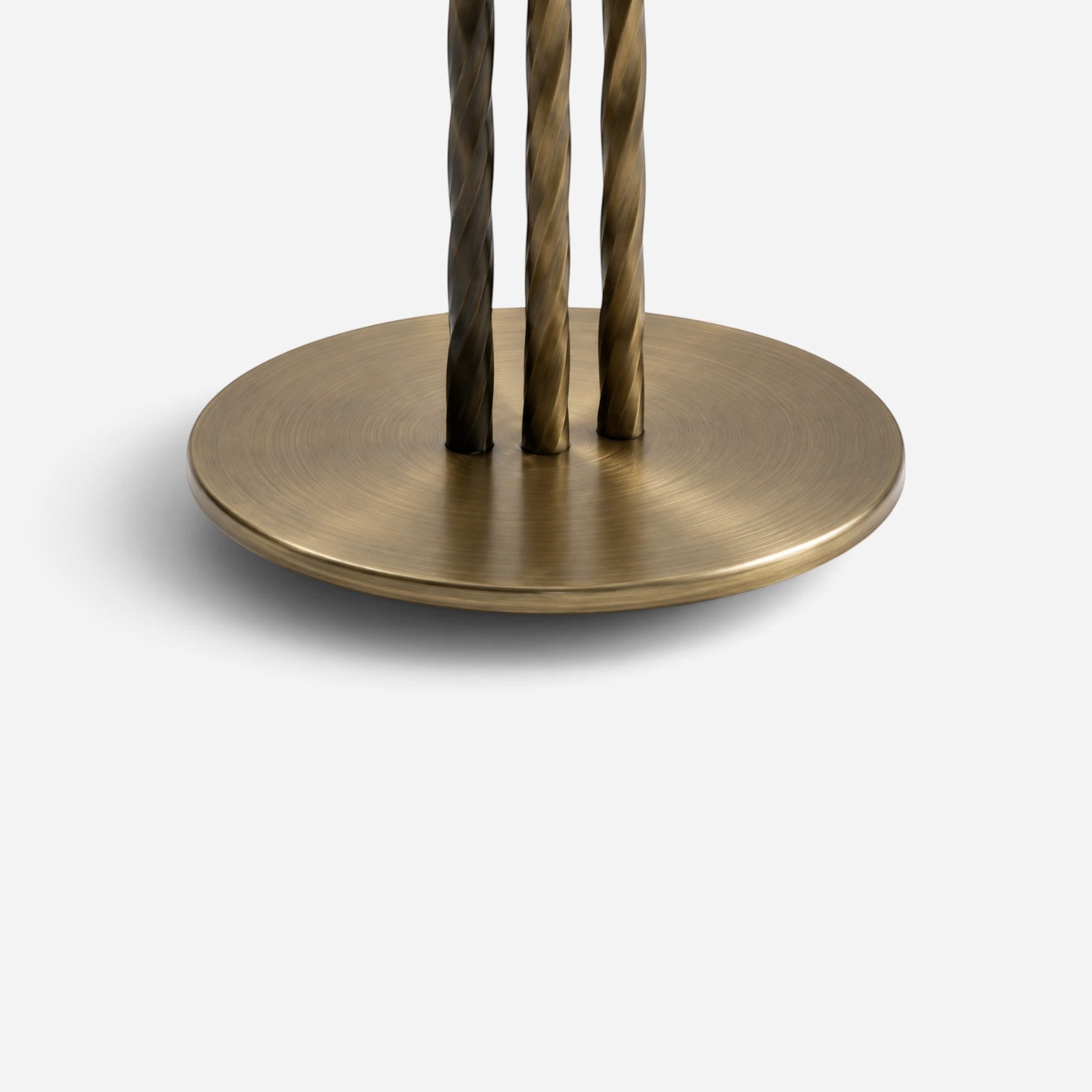 Addo Shop Product 6 featuring a circular brushed bronze base with three decorative twisted metal support rods