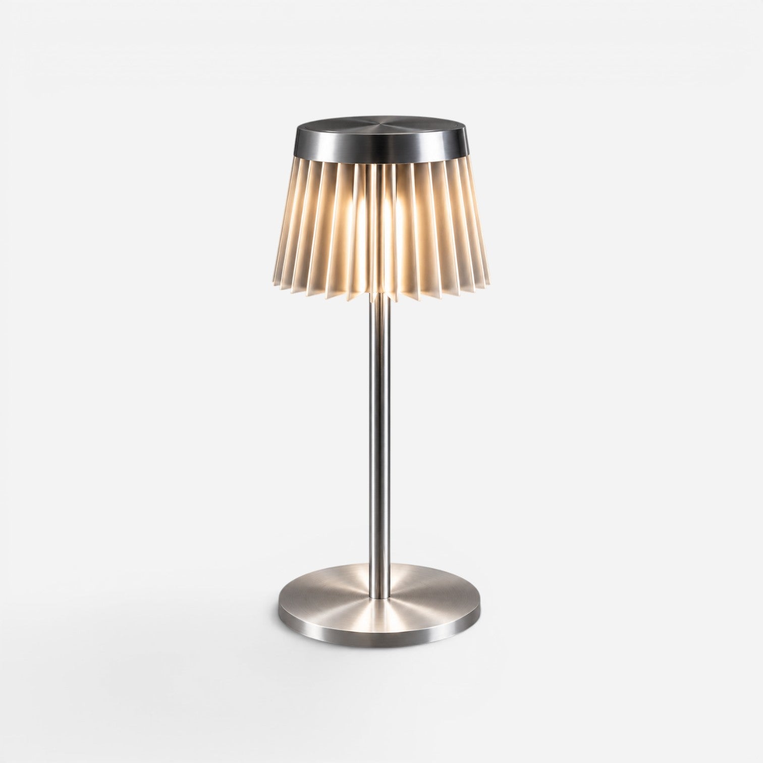 Addo Shop modern brushed metal table lamp with a pleated shade and warm ambient lighting