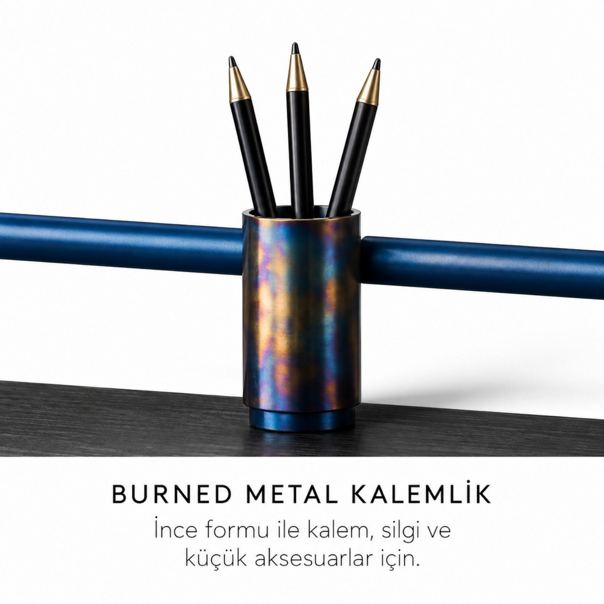 Addo Shop ODAK KURGU burned metal pencil holder with a unique iridescent finish holding three black pens