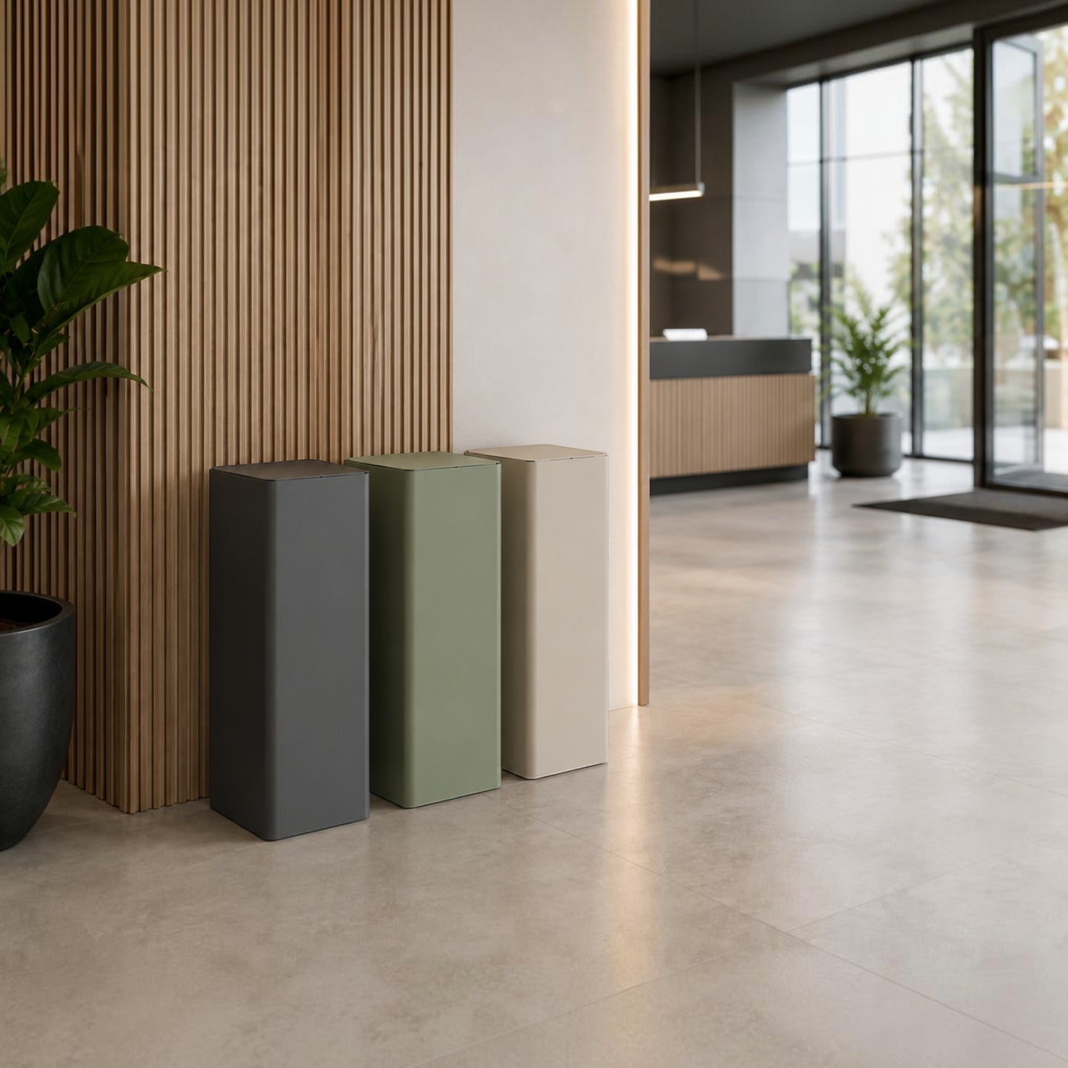 Addo Shop Centolitri 100L waste bins in charcoal, sage green, and beige, placed in a modern office lobby.