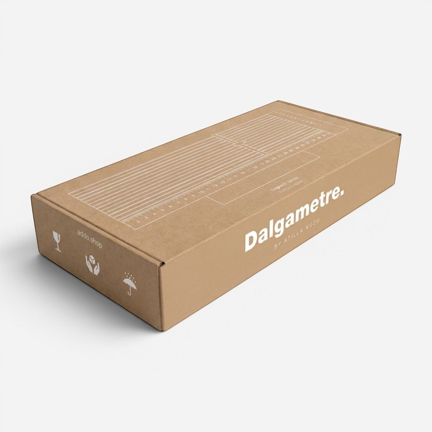 Addo Shop Dalgametre product packaging box made of brown cardboard with white printed ruler and branding details