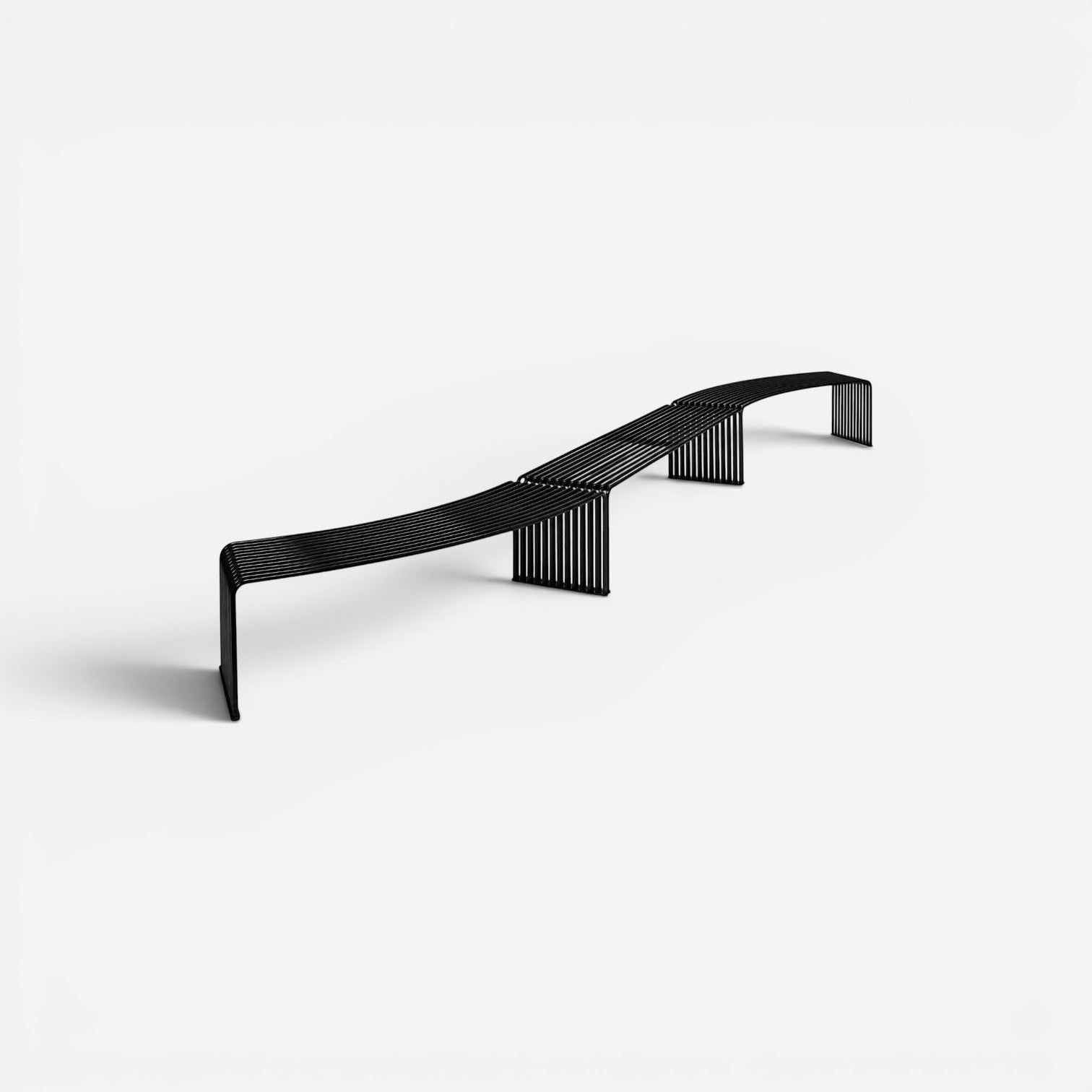 Addo Shop DIEMMEBI .015 black powder-coated steel modular outdoor bench with a curved slatted design.