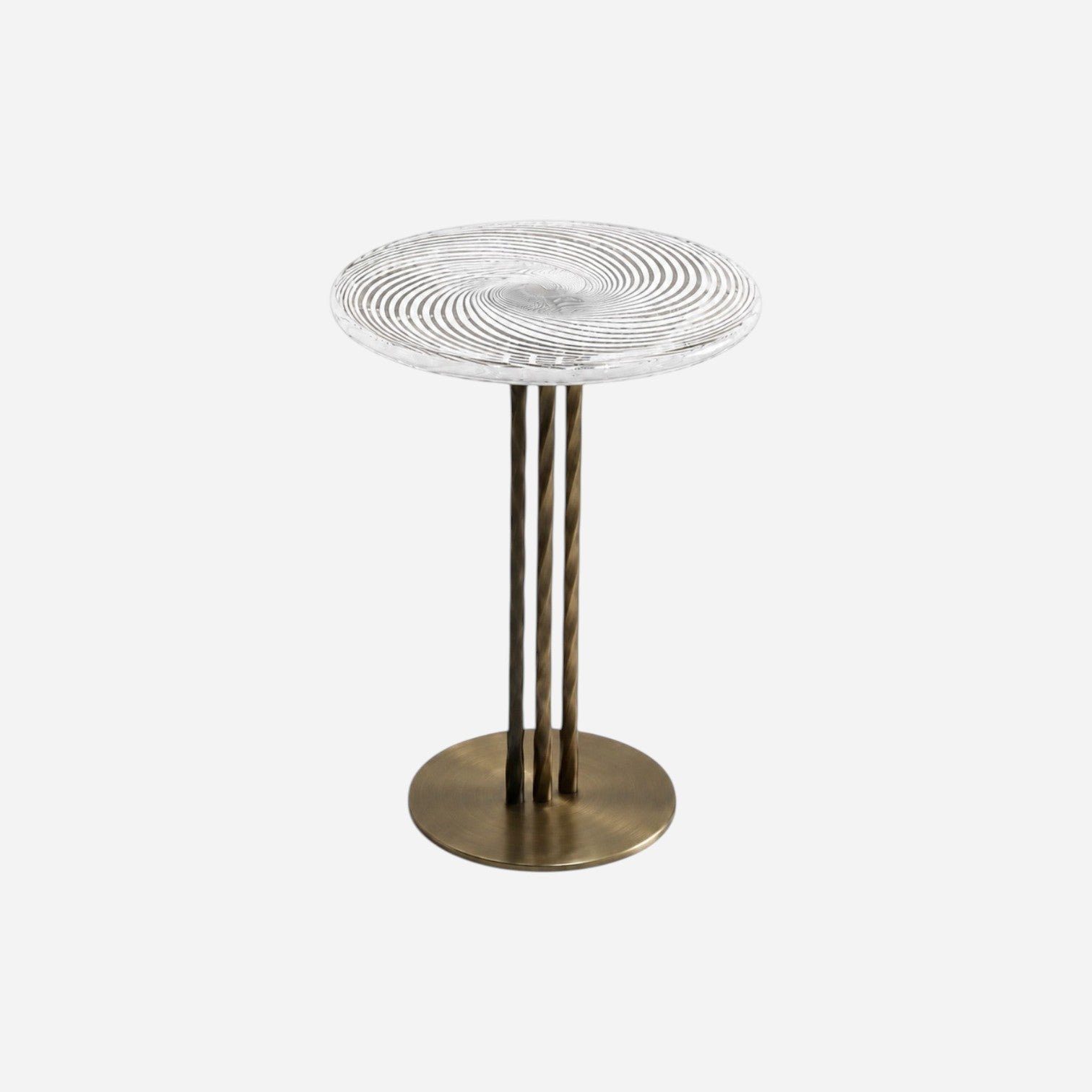 Addo Shop round side table with a clear glass swirl top and three twisted bronze metal legs on a circular base.