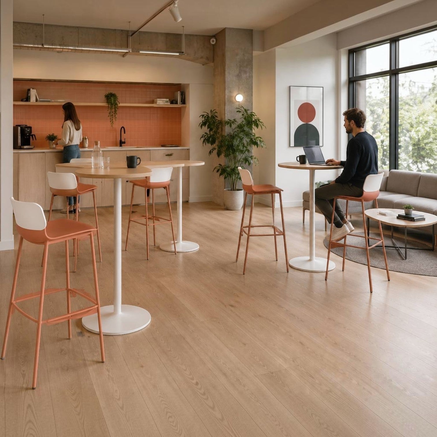 Addo Shop Greta bar stools with terracotta polypropylene seats and metal frames in a modern office breakout area.