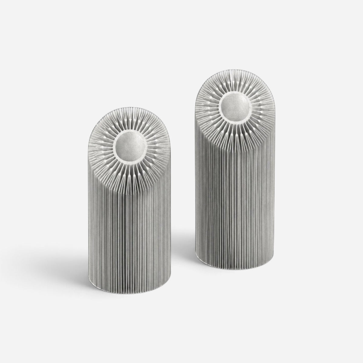 Addo Shop HELIO-2 brushed aluminum sculptural decorative object with a floral-inspired geometric design.