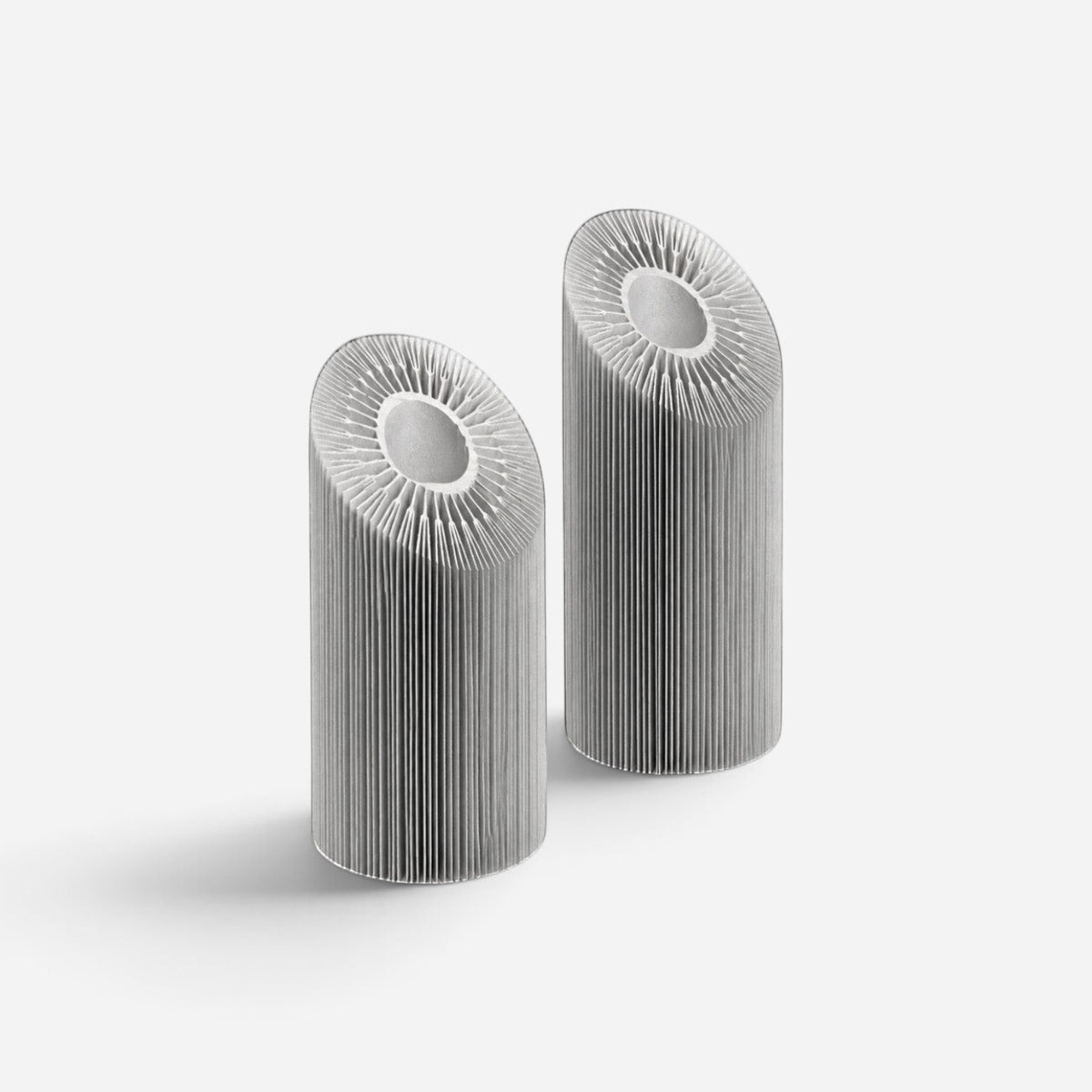 Addo Shop HELIO-2 brushed aluminum sculptural design object with a floral-inspired geometric form.