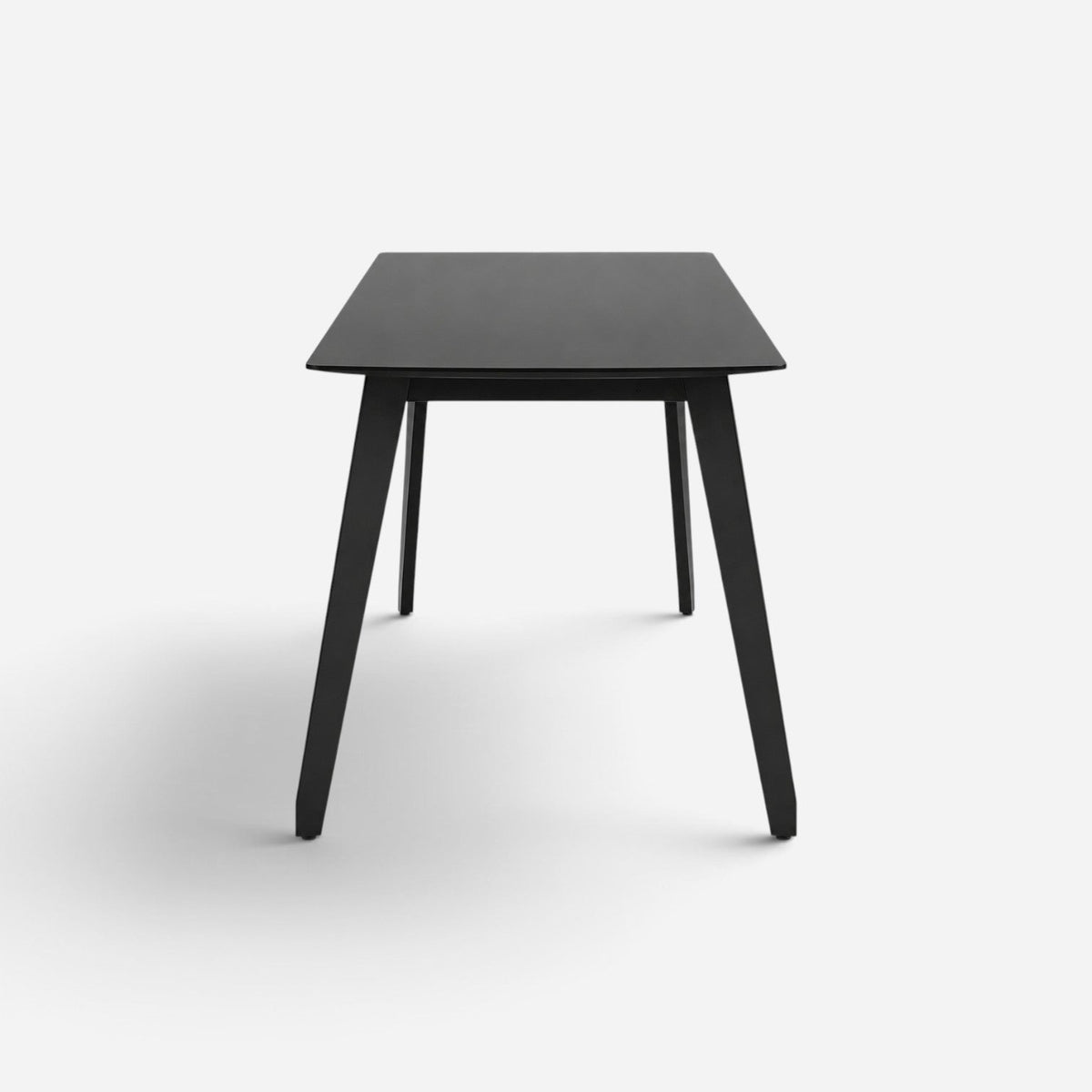 Addo Shop HUB W minimalist black wooden desk with tapered legs on a white background