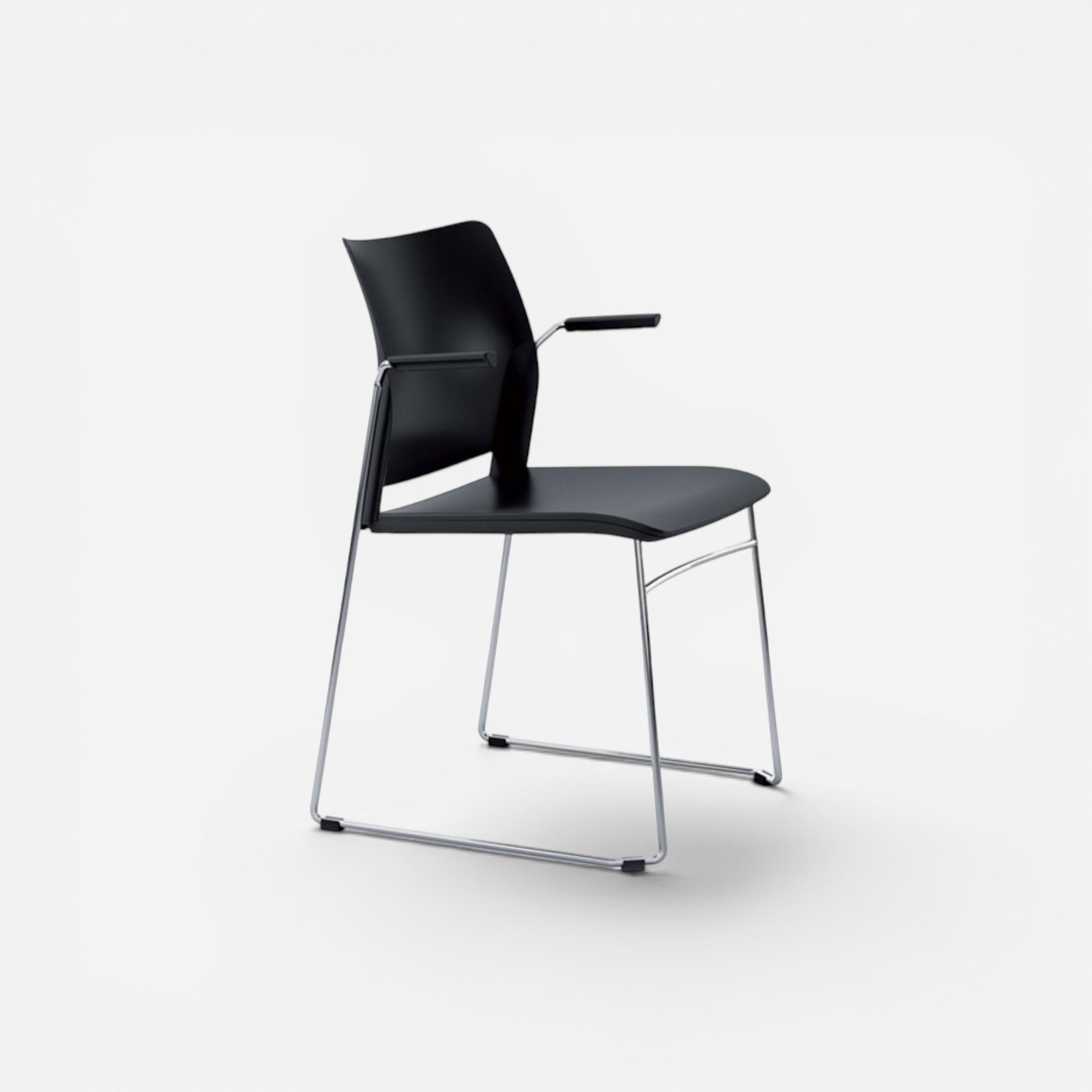 Addo Shop Incontro black plastic chair with chrome sled base and armrest