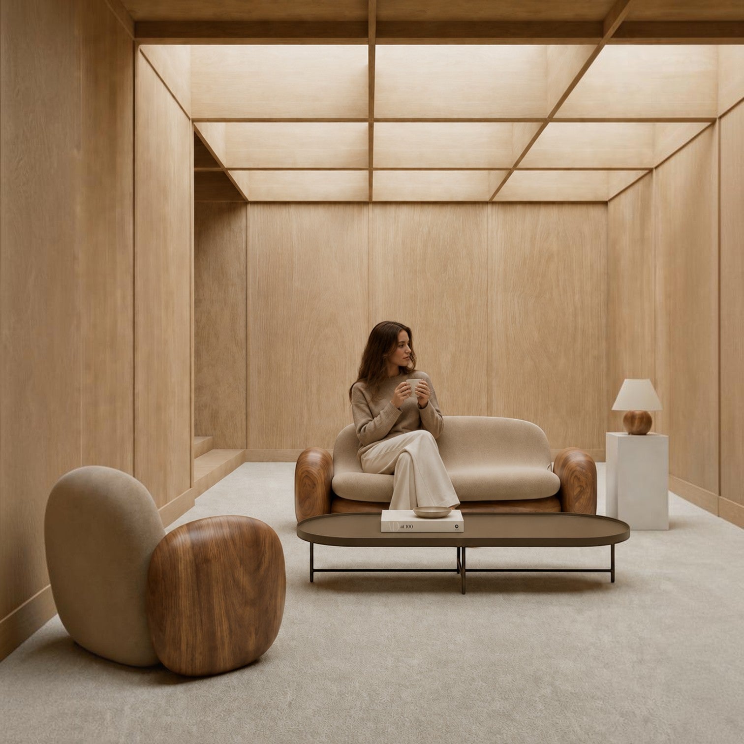 Addo Shop Indra oval coffee table with a dark brown lacquered top and metal frame in a minimalist wood-paneled room.