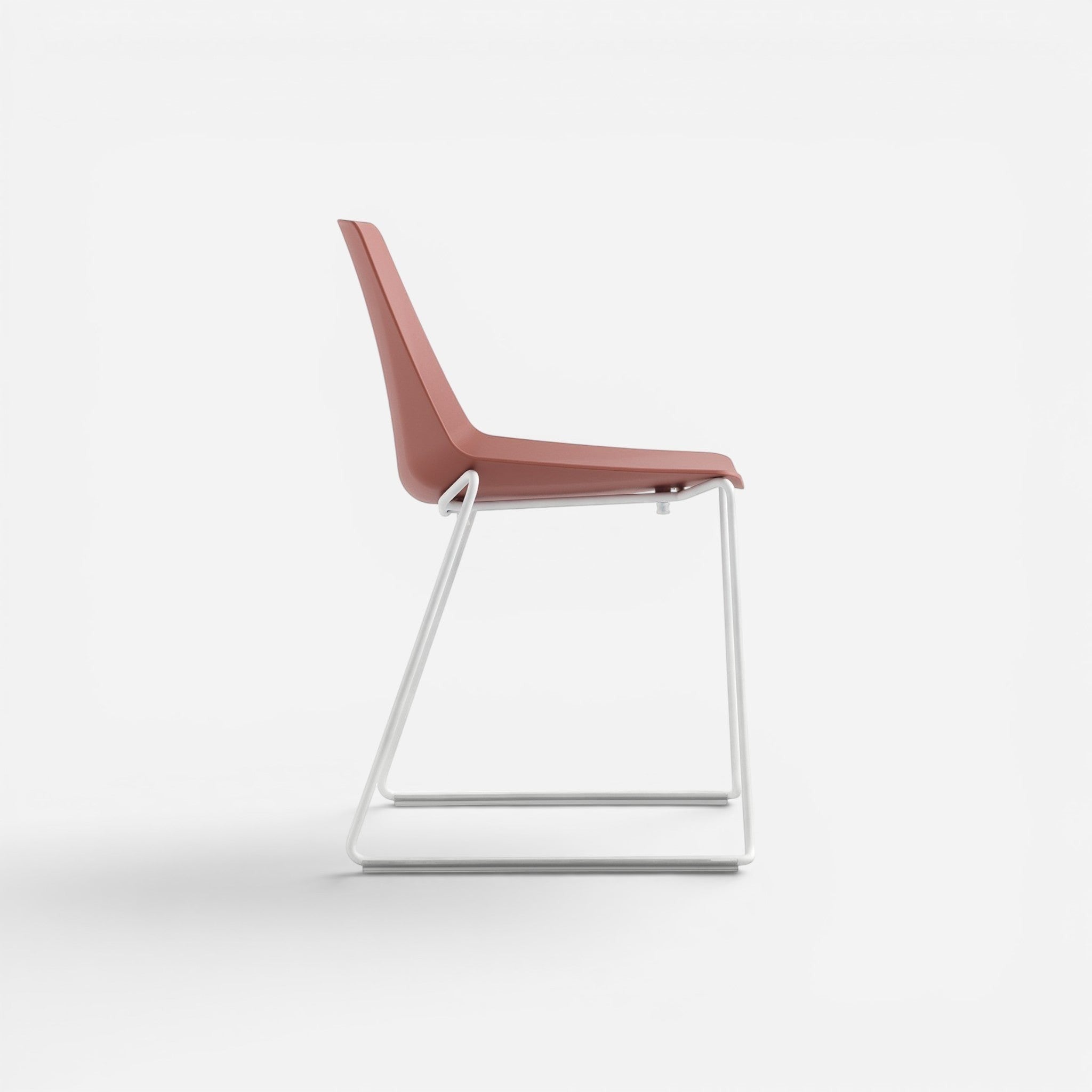 Addo Shop Marvin cafe chair with a dusty rose plastic seat and back, and white metal sled base.
