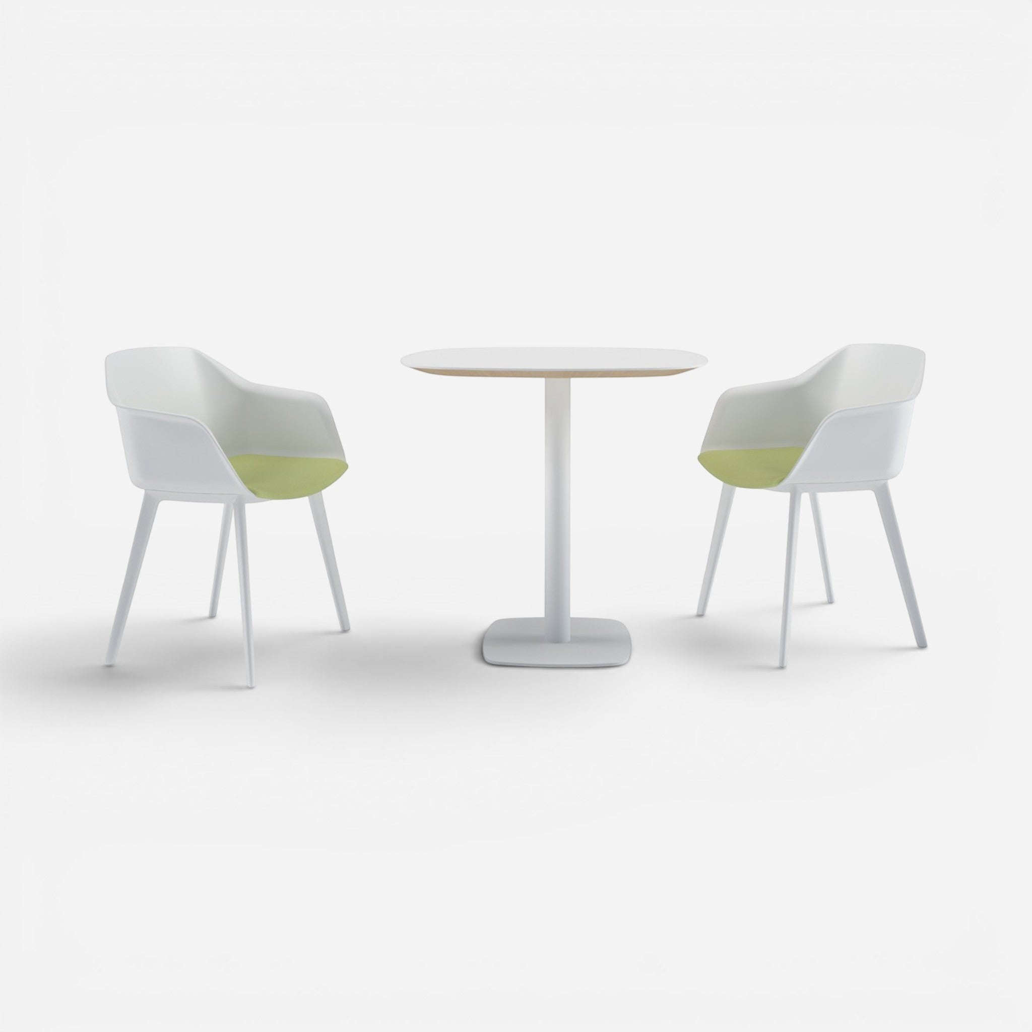 Addo Shop Miyu white laminate table with painted legs and two white chairs with light green seats.