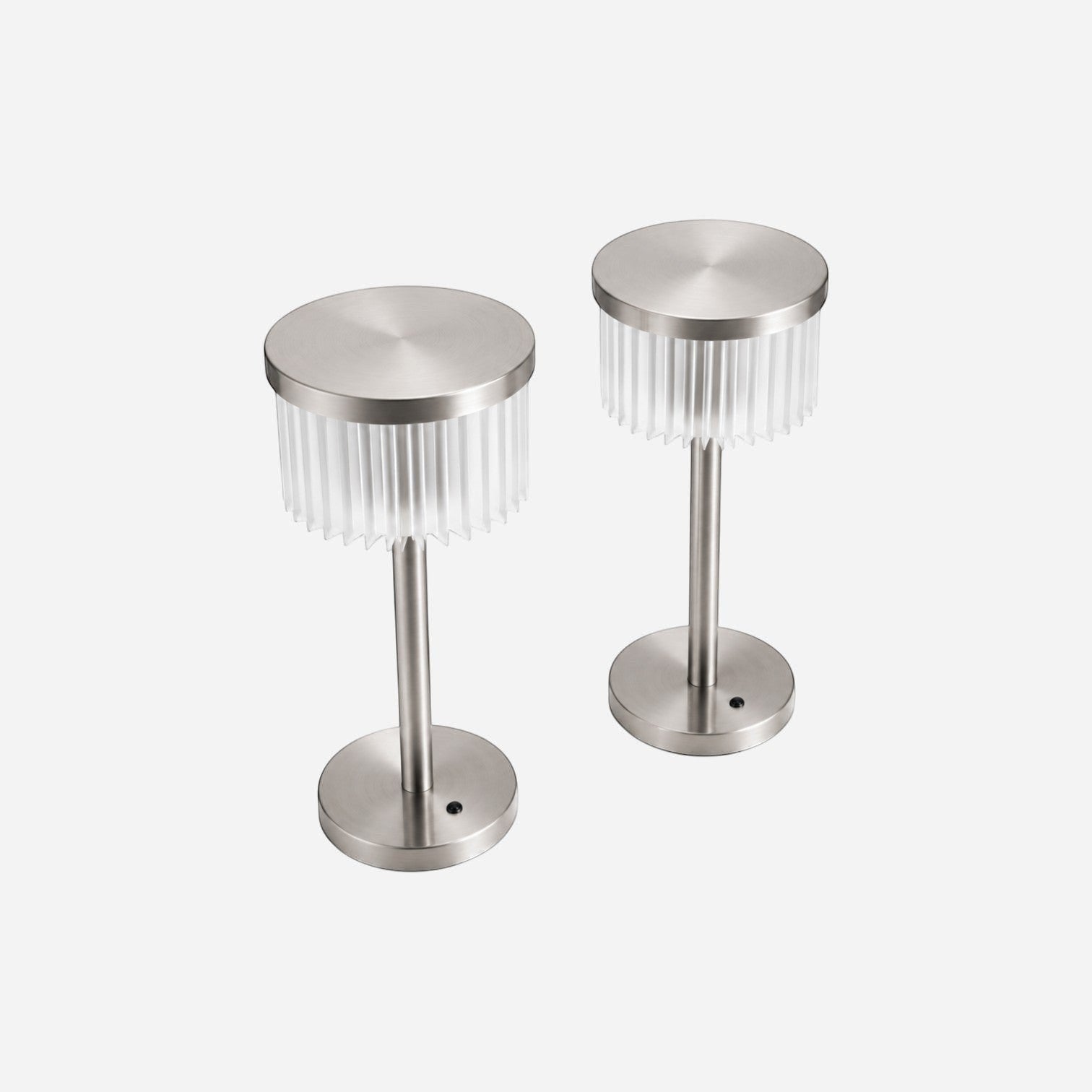 Addo Shop set of 2 modern brushed nickel table lamps with fluted clear acrylic shades and circular bases.
