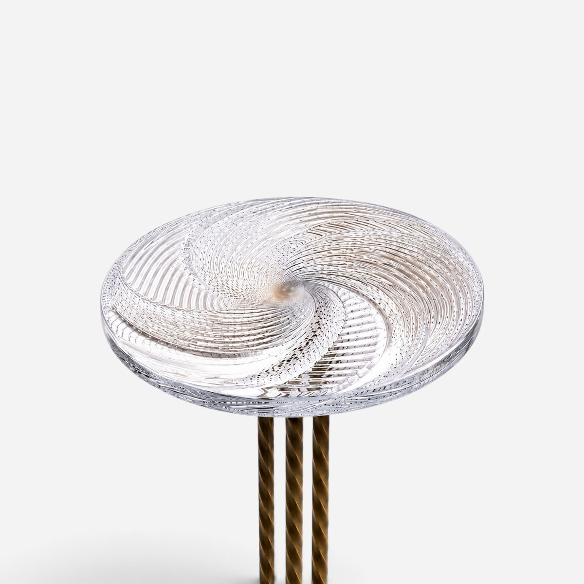 Addo Shop NAVIN Büyük side table with a handcrafted Cesm-i Bülbül spiral glass top and a bronze metal base.
