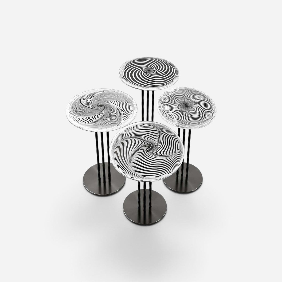 Addo Shop NAVIN Quartet nesting coffee table set featuring four round tables with black and white spiral patterns
