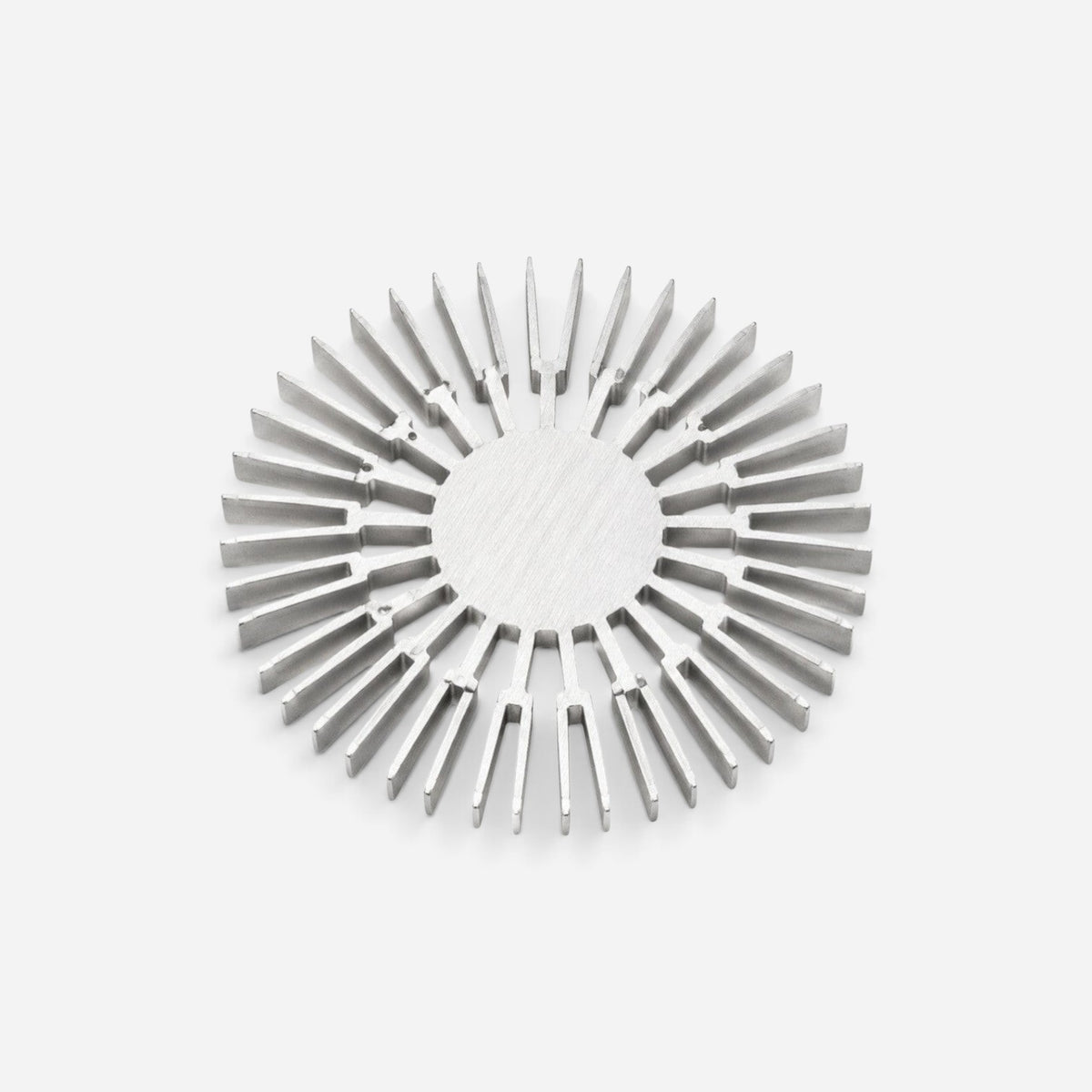 Addo Shop NE-BU-LA sculptural design object made of brushed aluminum with a radial industrial extrusion profile.