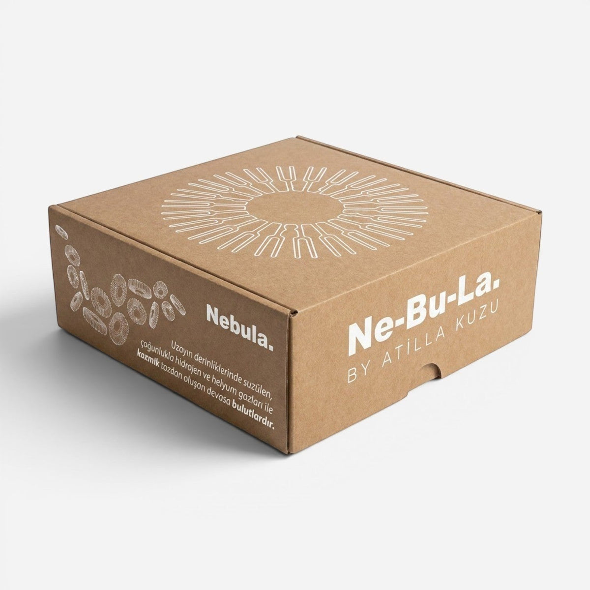 Addo Shop NE-BU-LA cardboard product box with white cosmic-themed graphic prints and typography