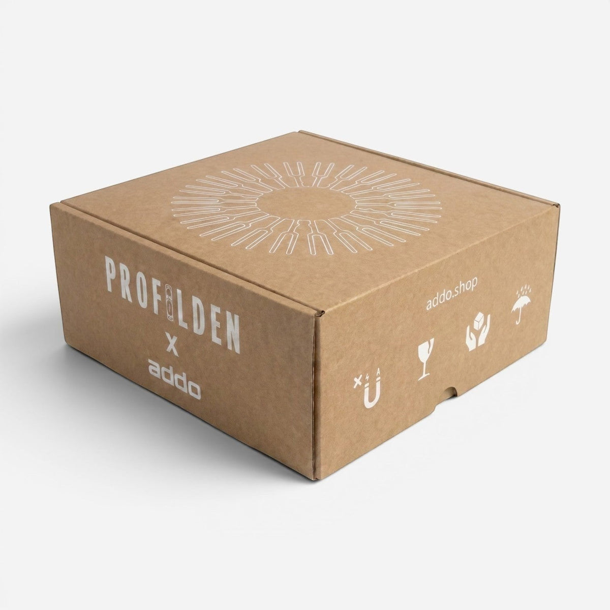 Addo Shop NE-BU-LA brown cardboard shipping box with white branding and shipping icons