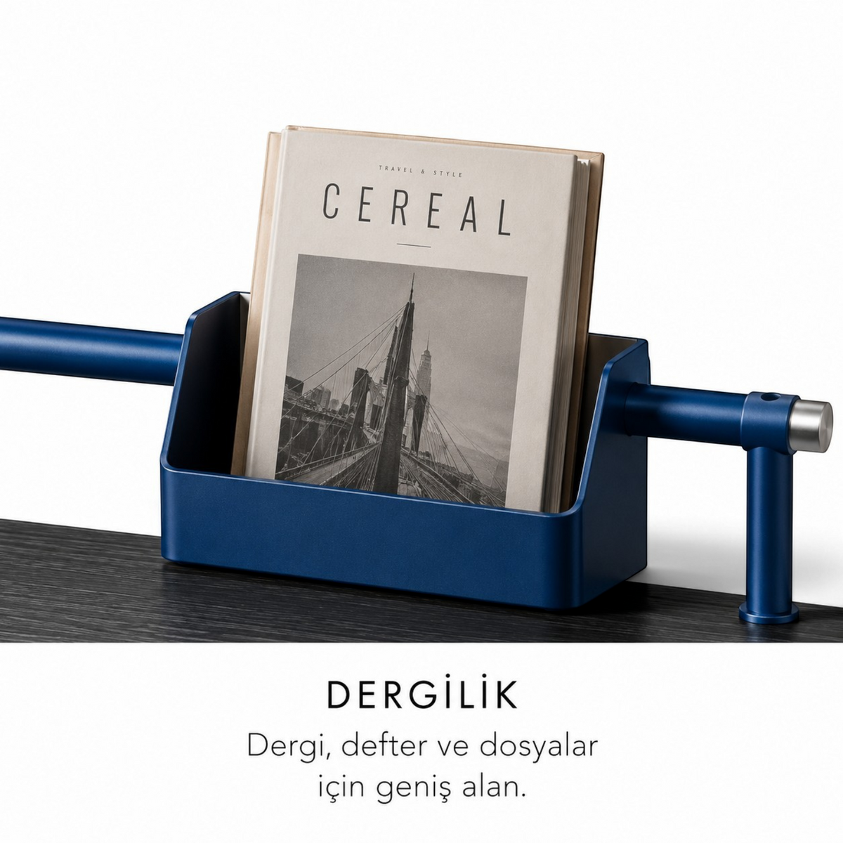 Addo Shop ODAK KURGU blue metal desk magazine holder with a Cereal magazine on a black wooden surface