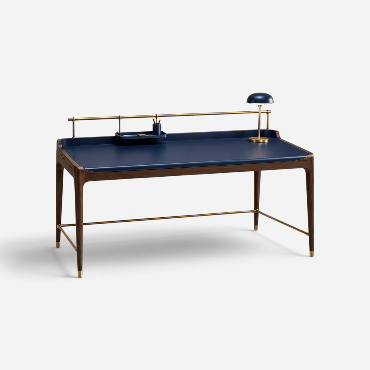 Addo Shop ODAK RAY desk featuring a dark blue leather-topped surface, walnut wood frame, and brass accents.