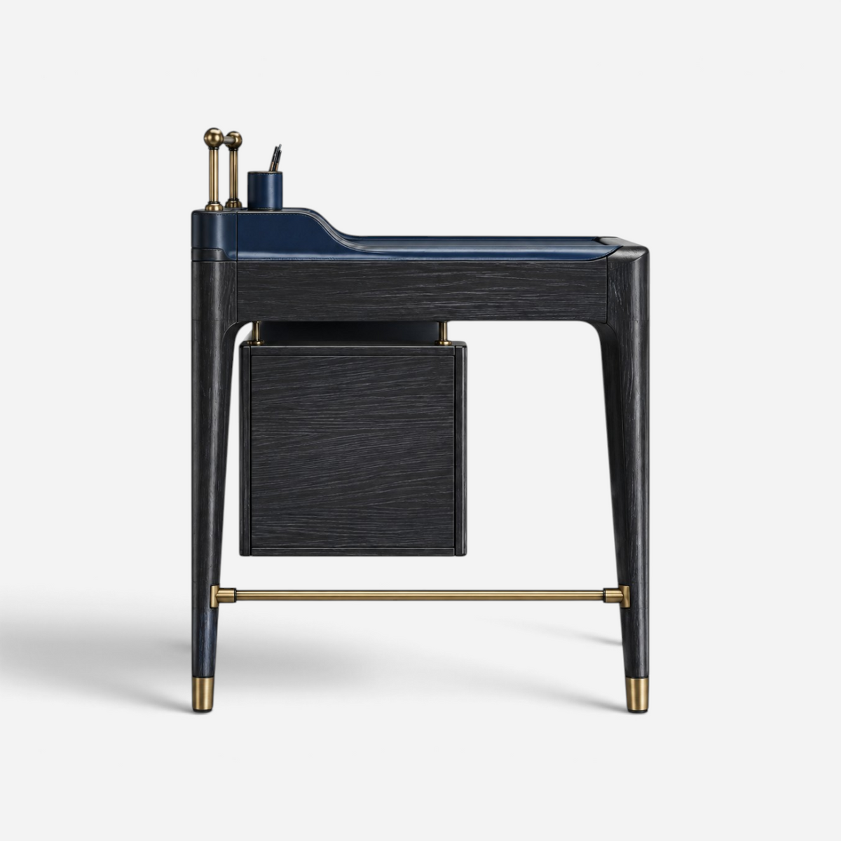 Addo Shop ODAK RAY desk with dark wood frame, navy blue surface, brass accessory rail, and hanging storage drawer.