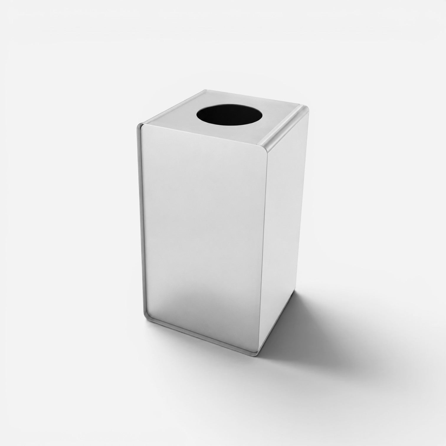 Addo Shop Caimi Prisma rectangular metal recycling bin with a circular top opening for office or public spaces.