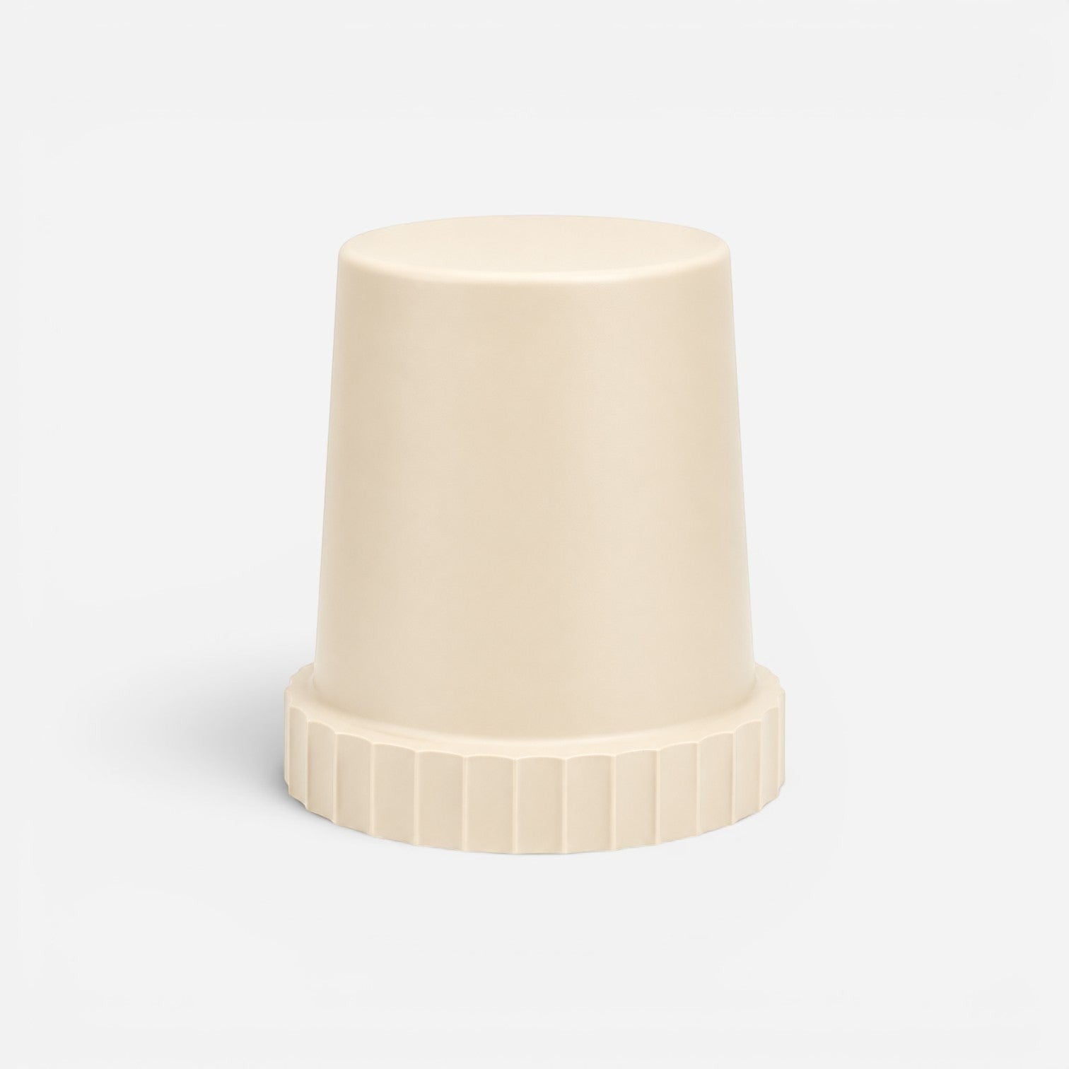 Addo Shop Raffles System Stool in a minimalist beige finish with a textured, fluted base design.