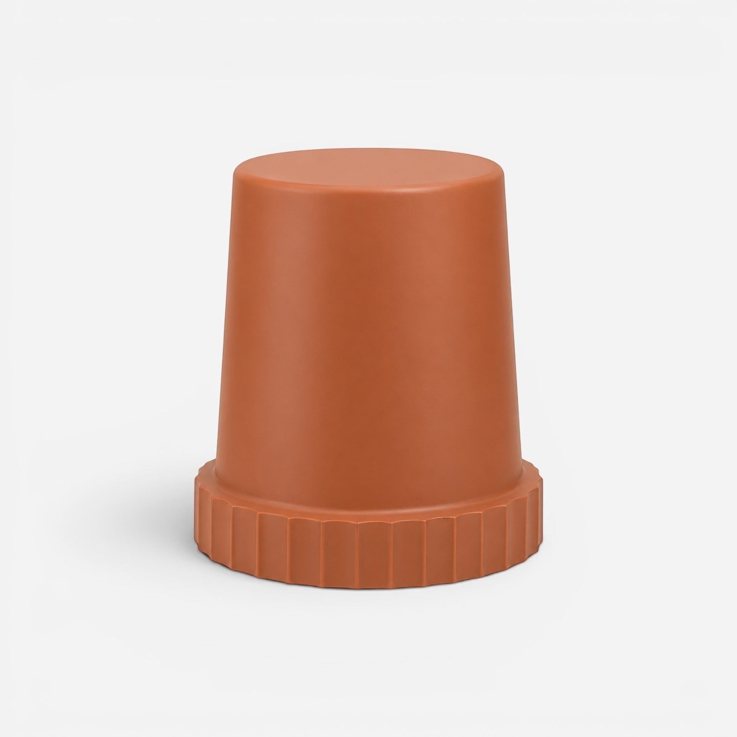 Addo Shop Raffles System Stool in terracotta with a smooth top and a fluted base design.