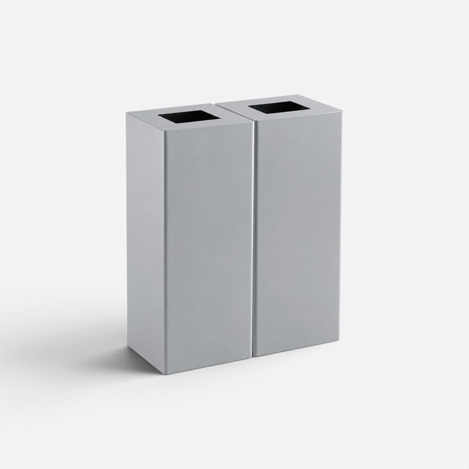 Addo Shop Riciclo 60L dual compartment silver metal recycling bin with a modern minimalist design.
