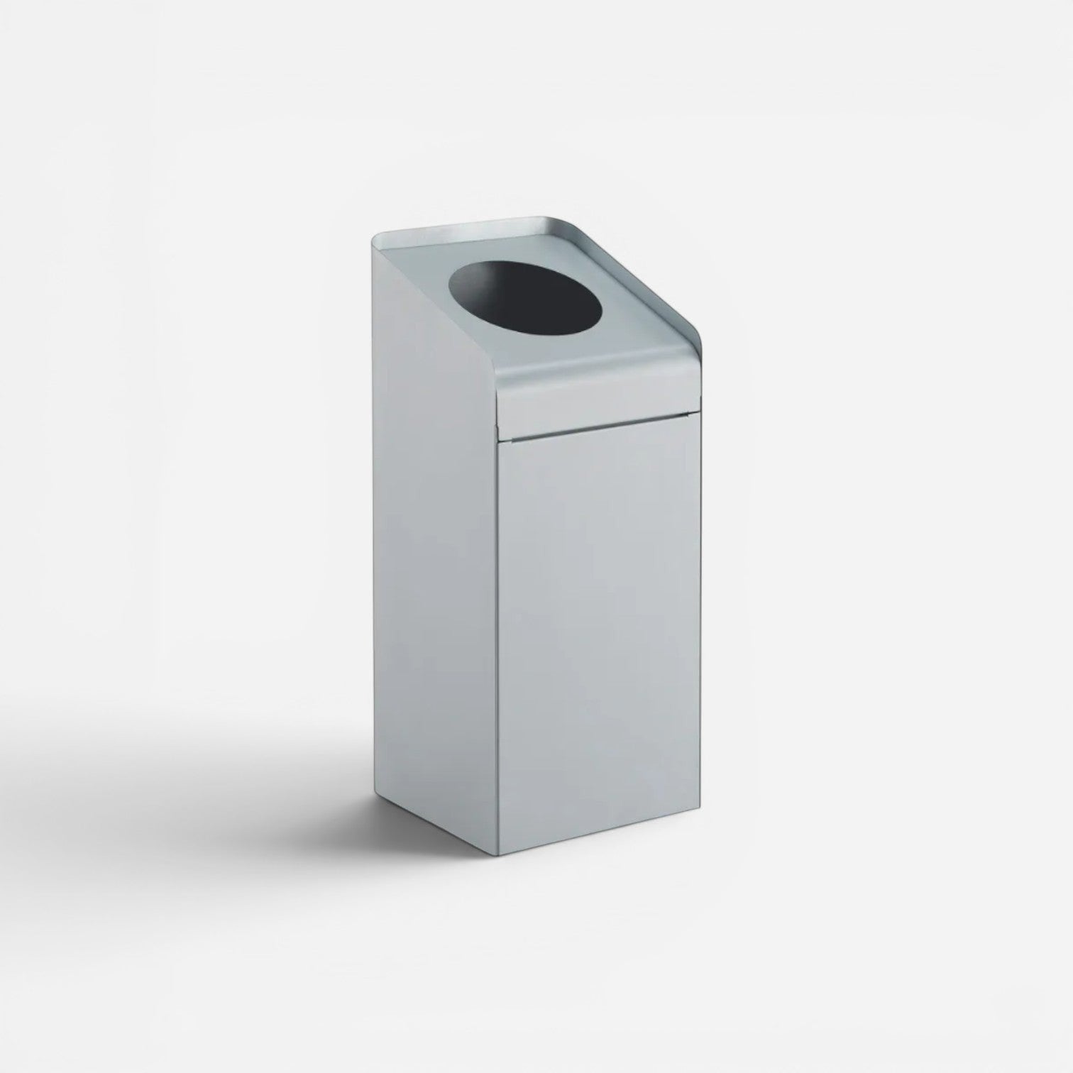Addo Shop Riciclo Curve 70L silver metal recycling bin with a modern slanted top and circular opening
