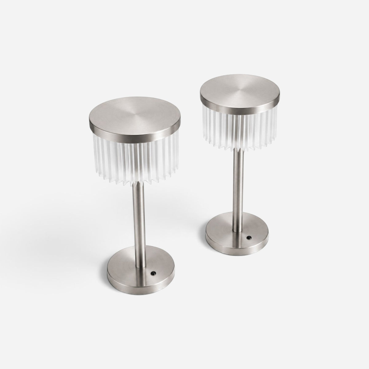 Two Addo Shop ŞEMS-1 brushed aluminum table lamps with cylindrical fluted glass shades on a white background.