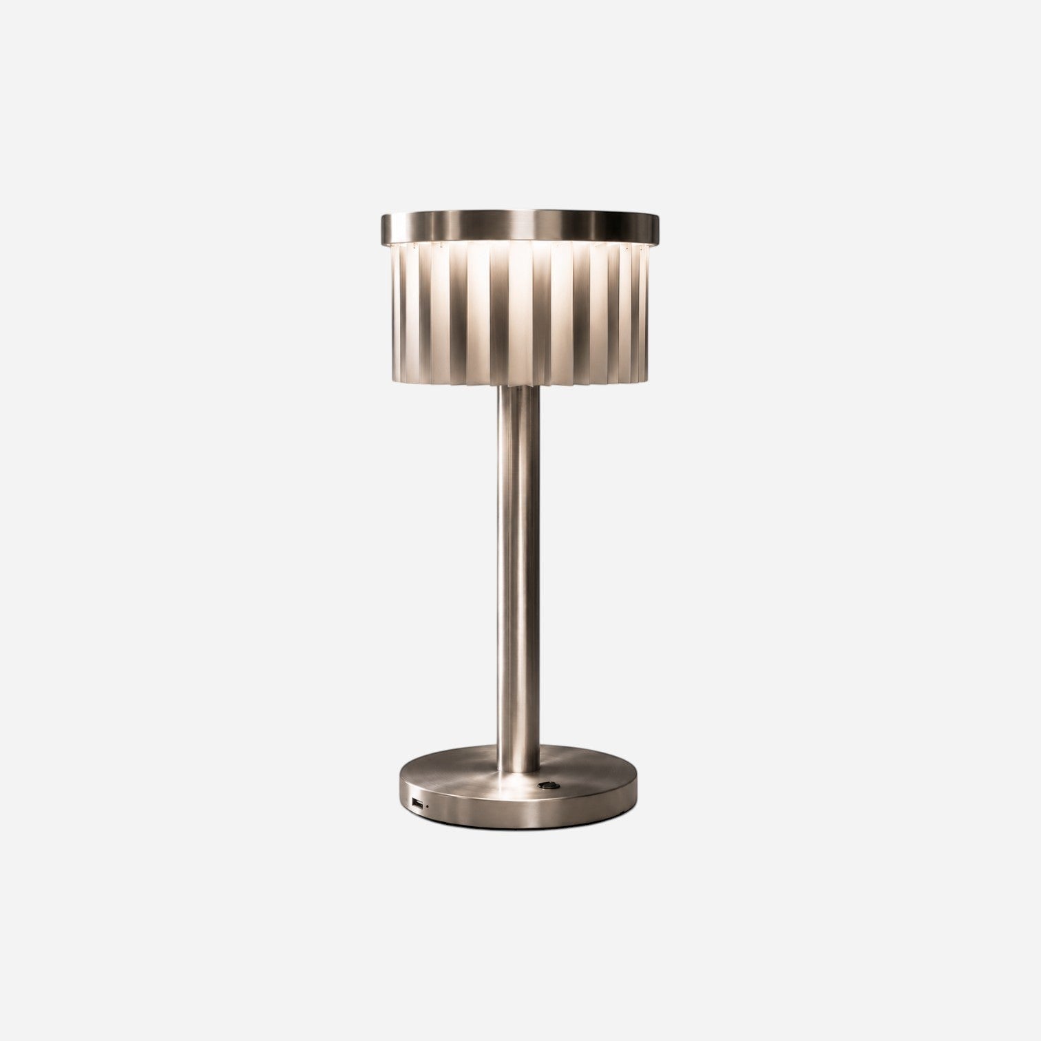 Addo Shop Şems-1 modern brushed metal table lamp with a cylindrical slatted shade and warm integrated LED lighting