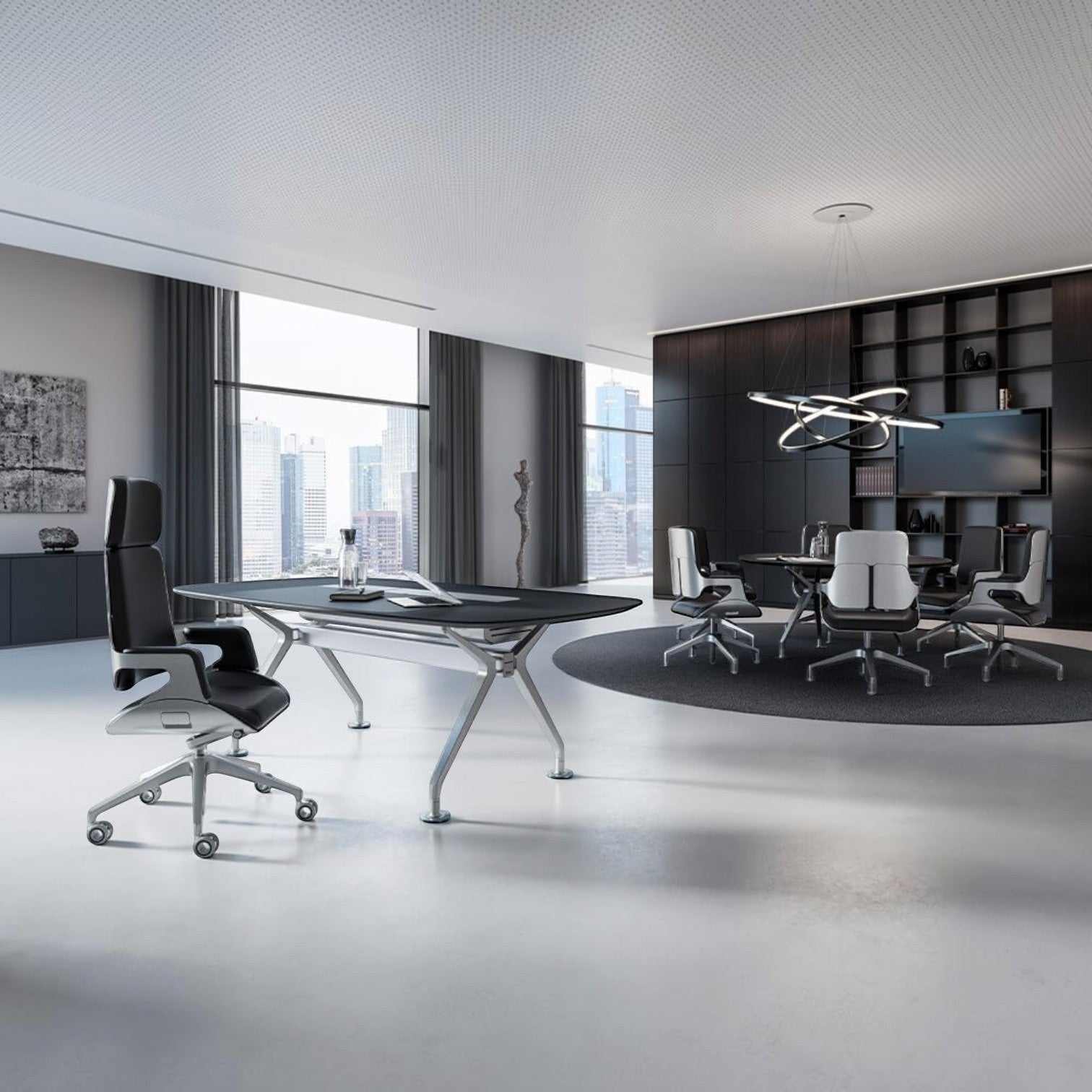 Addo Shop SILVER executive chair by Hadi Teherani featuring a black upholstered seat and sleek aluminum frame in an office