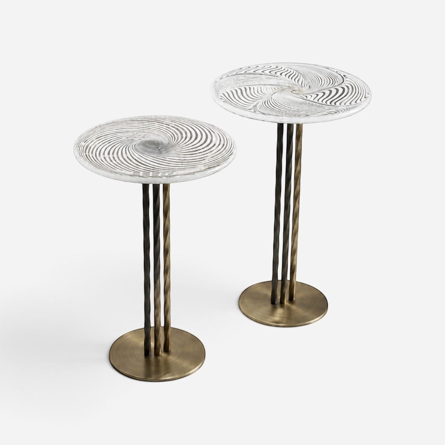 Addo Shop set of two round side tables with clear glass tops featuring a spiral pattern and bronze twisted metal legs