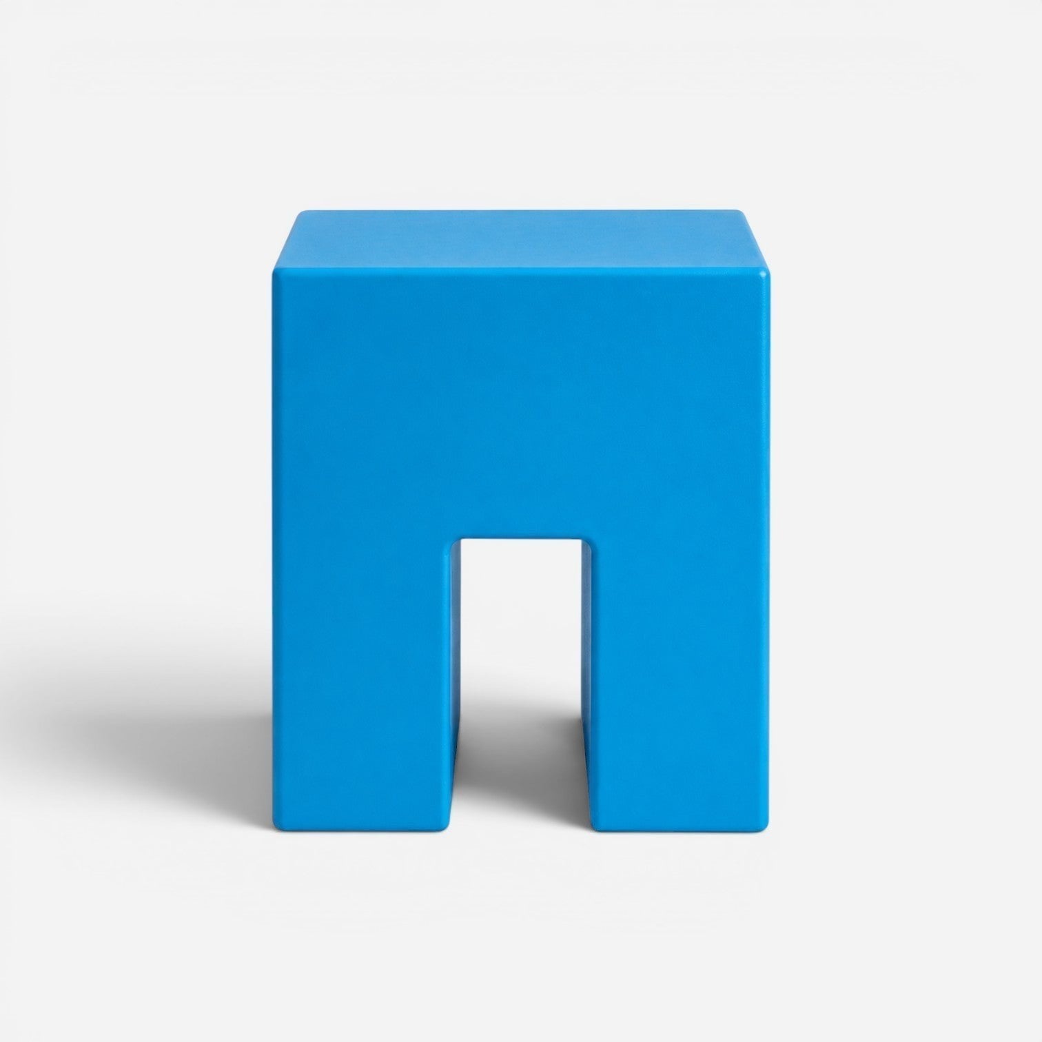 Addo Shop STILEMI Cube modern blue minimalist stool with a geometric cutout design on a white background.