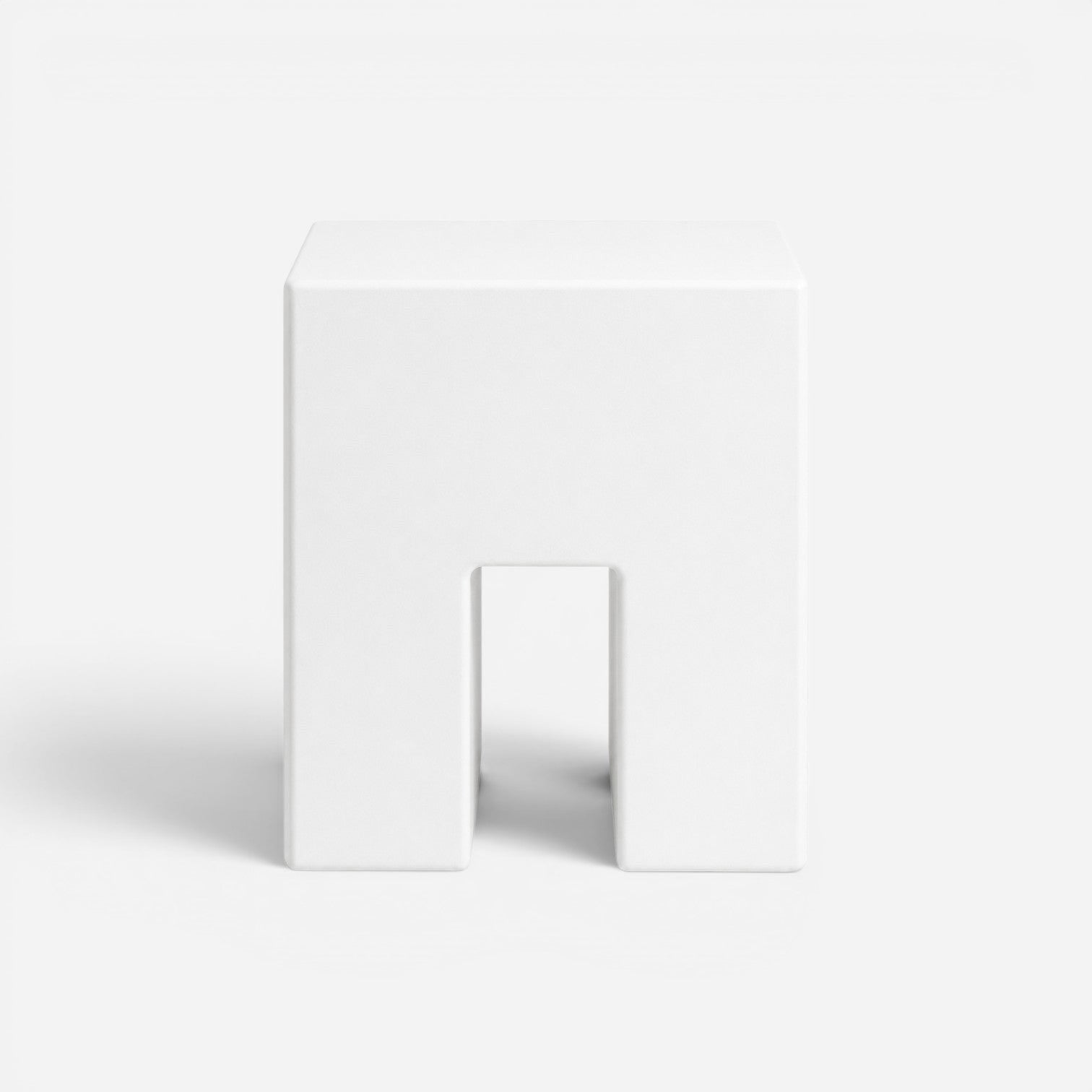 Addo Shop STILEMI Cube minimalist white stool with a modern geometric cutout design on a clean white background.