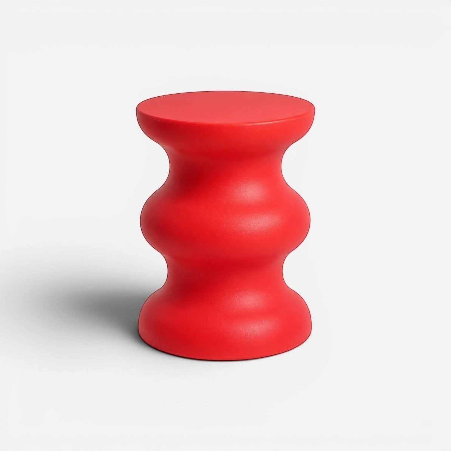Addo Shop STILEMI Sculptural stool in vibrant red with a rounded, hourglass-inspired modern design.