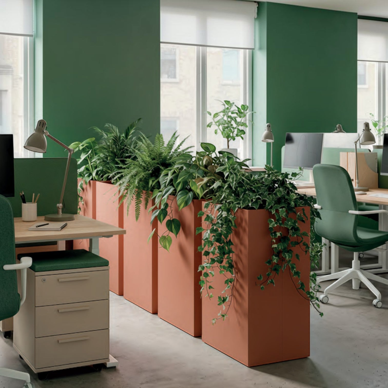 Addo Shop tall terracotta rectangular office planter used as a room divider with lush green indoor plants
