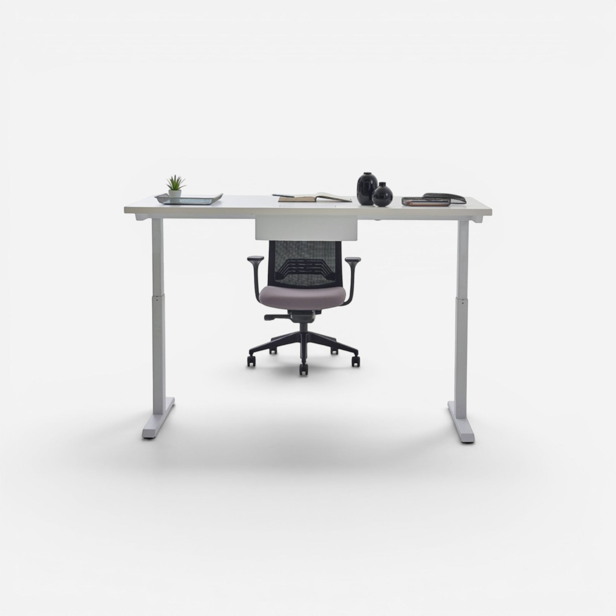 Addo Shop Up Down ergonomic sit-stand desk with white laminate top and silver metal legs, 160x80cm