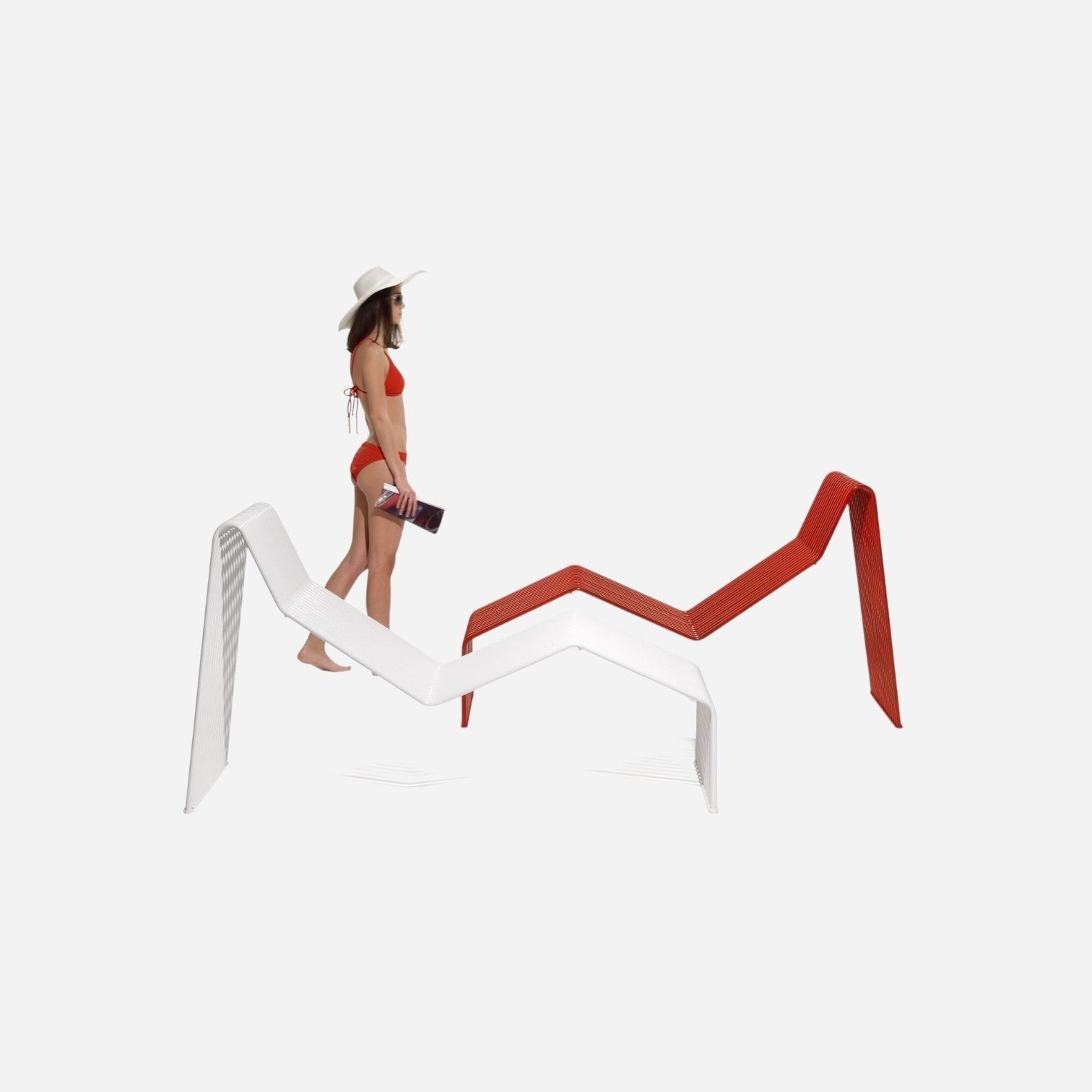 Addo Shop Zeroquindici .015 metal wire chaise longue in red and white with a model in a bikini and sun hat.