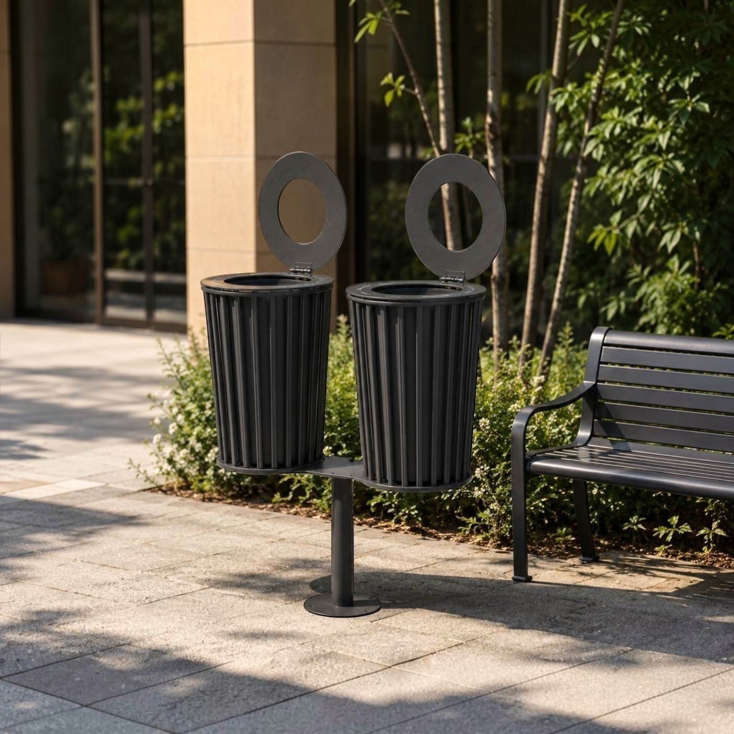Addo Shop Zeroquindici .015 small double litter bin in dark grey metal with circular lids for outdoor public spaces.