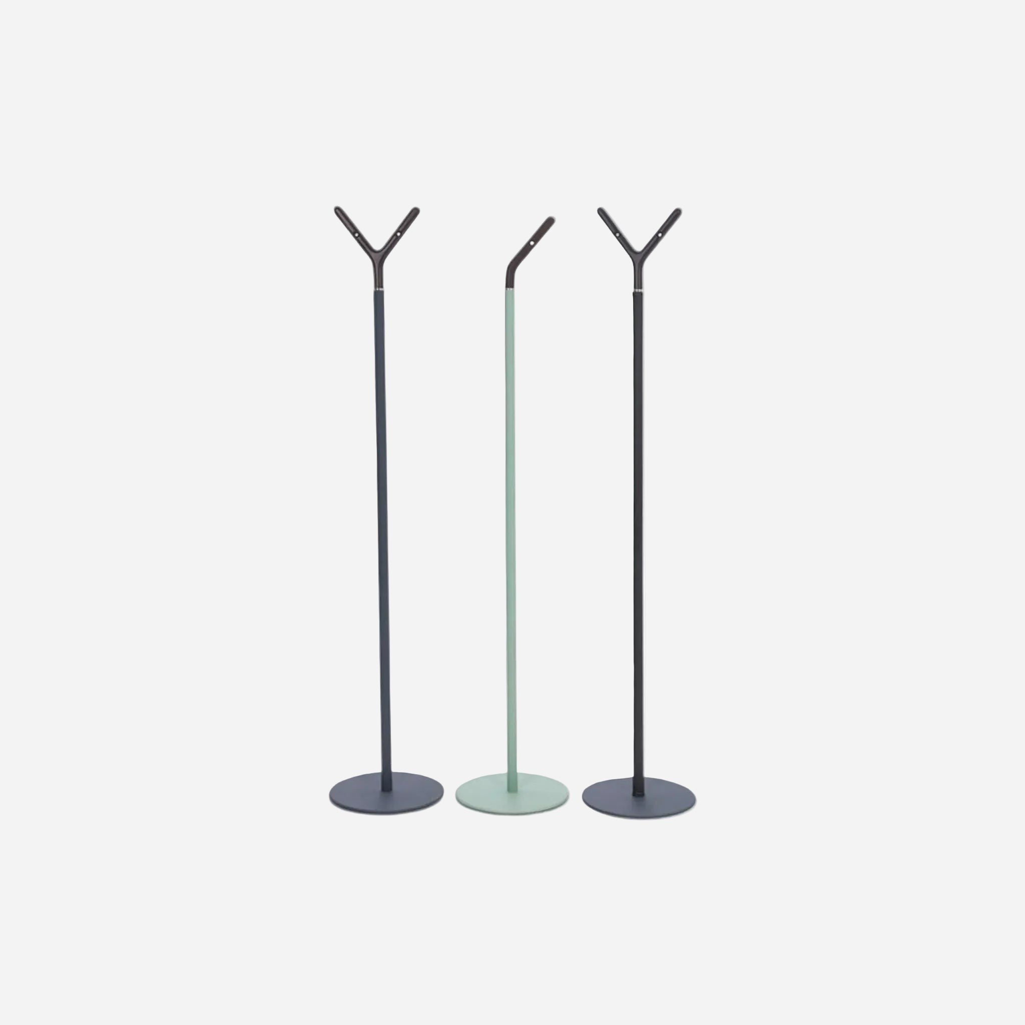 Addo Shop Alfred coat rack with metal stem and wooden top in navy, sage green, and charcoal.