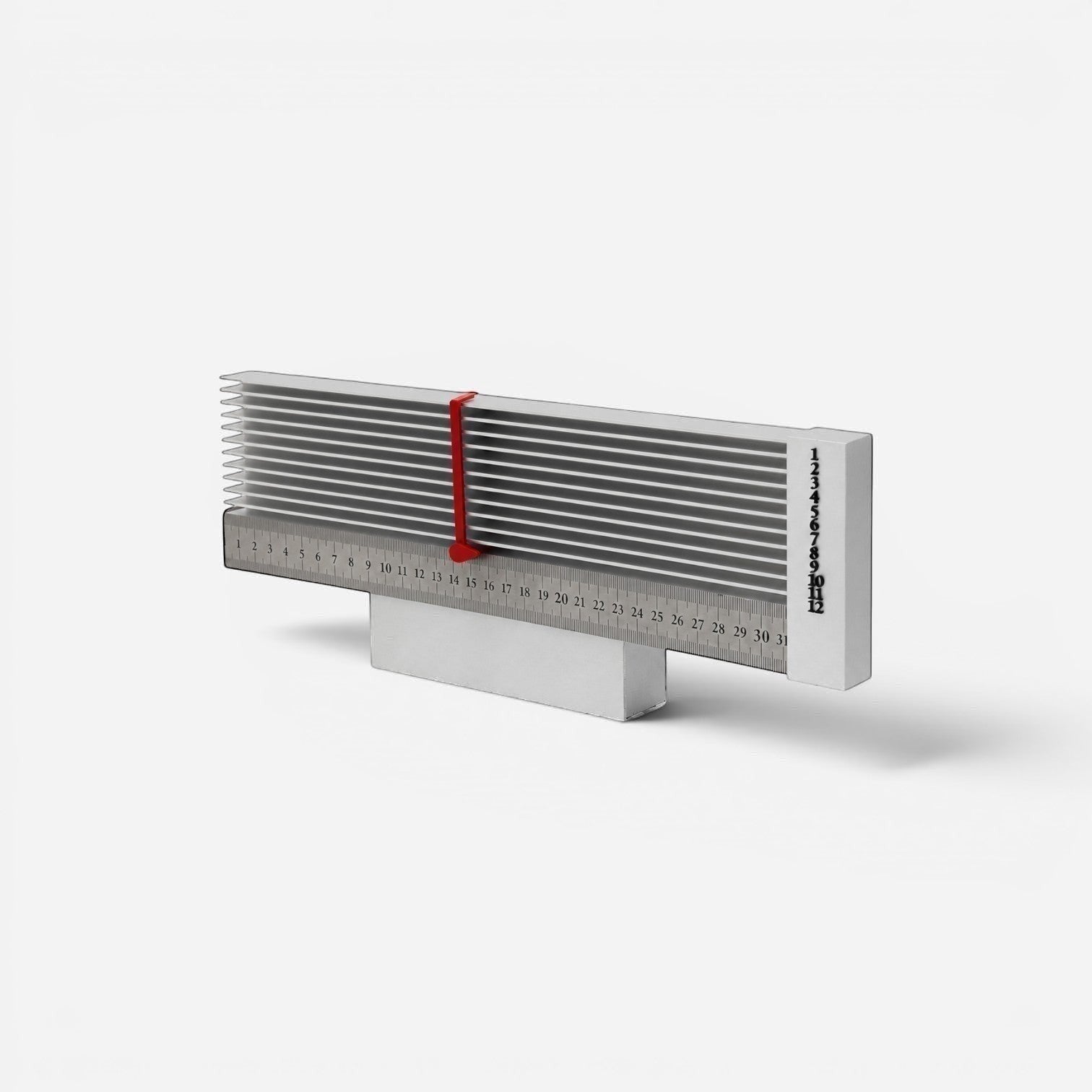 Addo Shop aluminum desk calendar with ruler and red day indicator. Modern minimalist design.